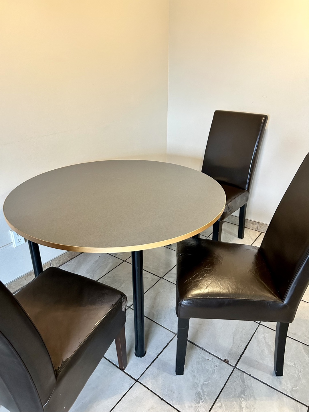 Round Dining Table with Three Chairs