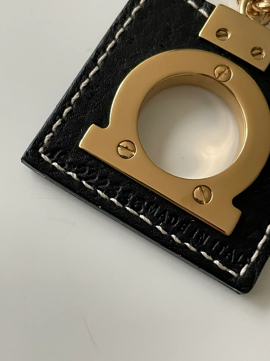 Authentic Salvatore Ferragamo Keychain Black & Gold image indicator(3)