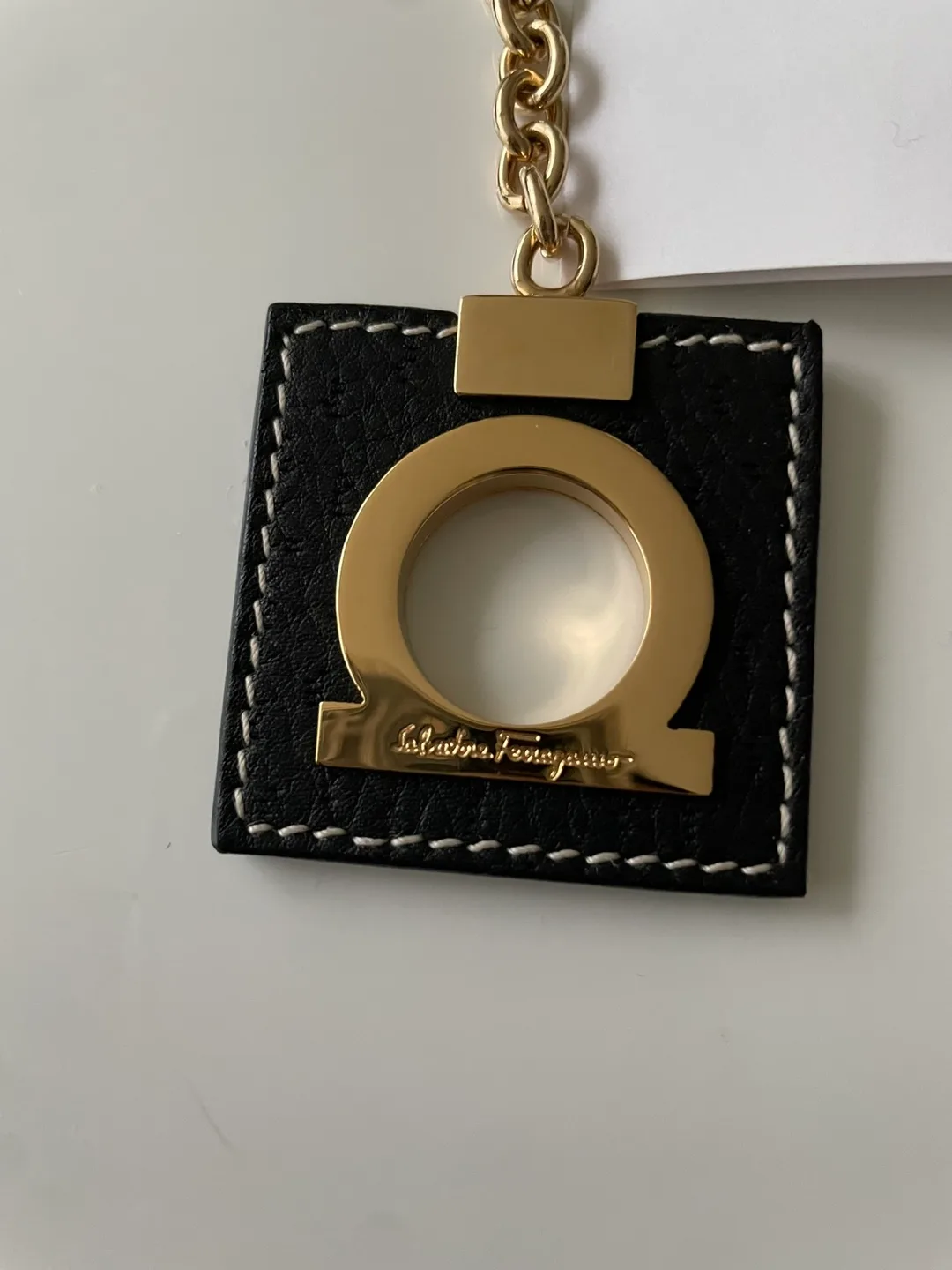 Authentic Salvatore Ferragamo Keychain Black & Gold image indicator(2)
