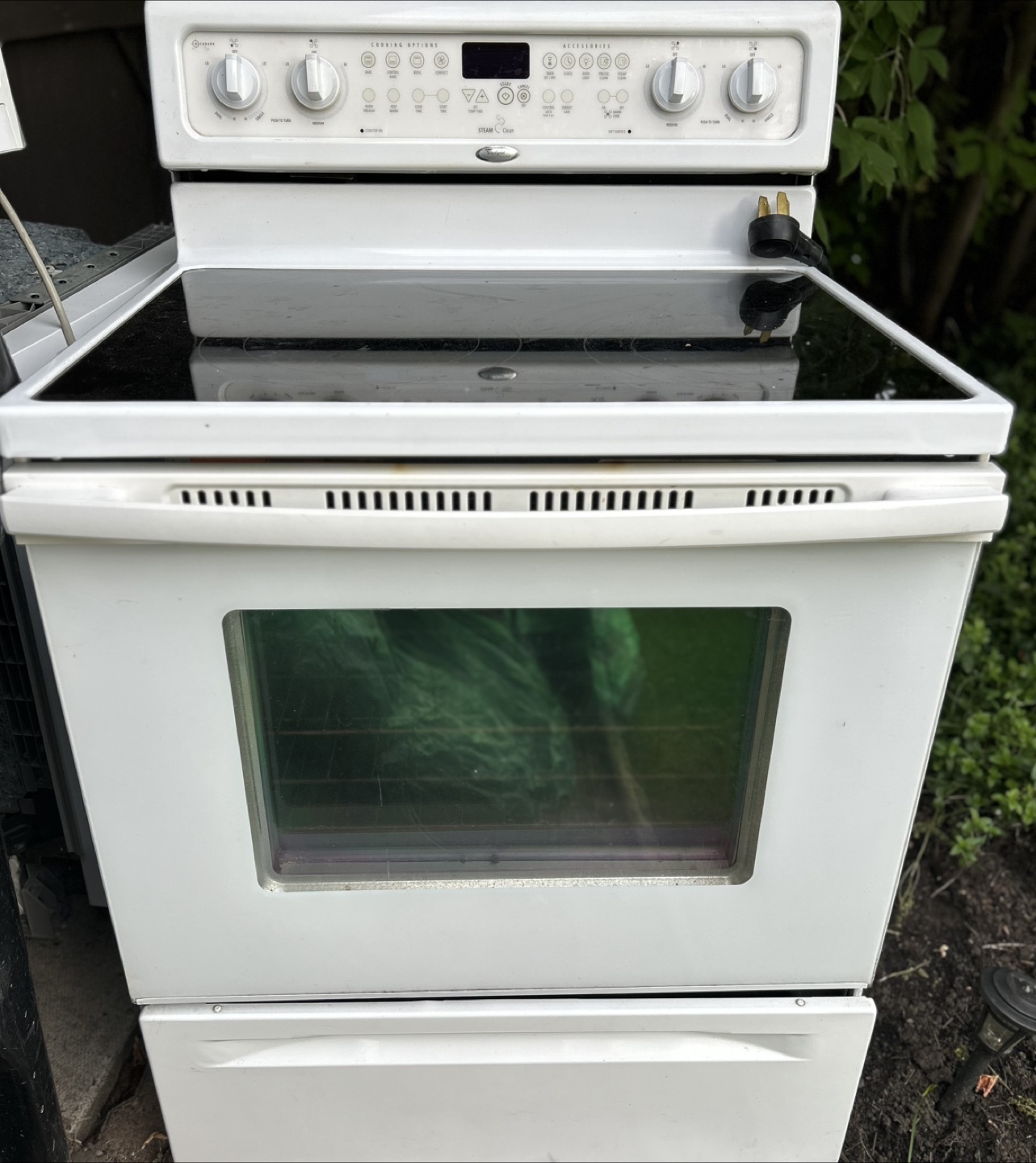 White Whirlpool Stove & Panasonic Microwave