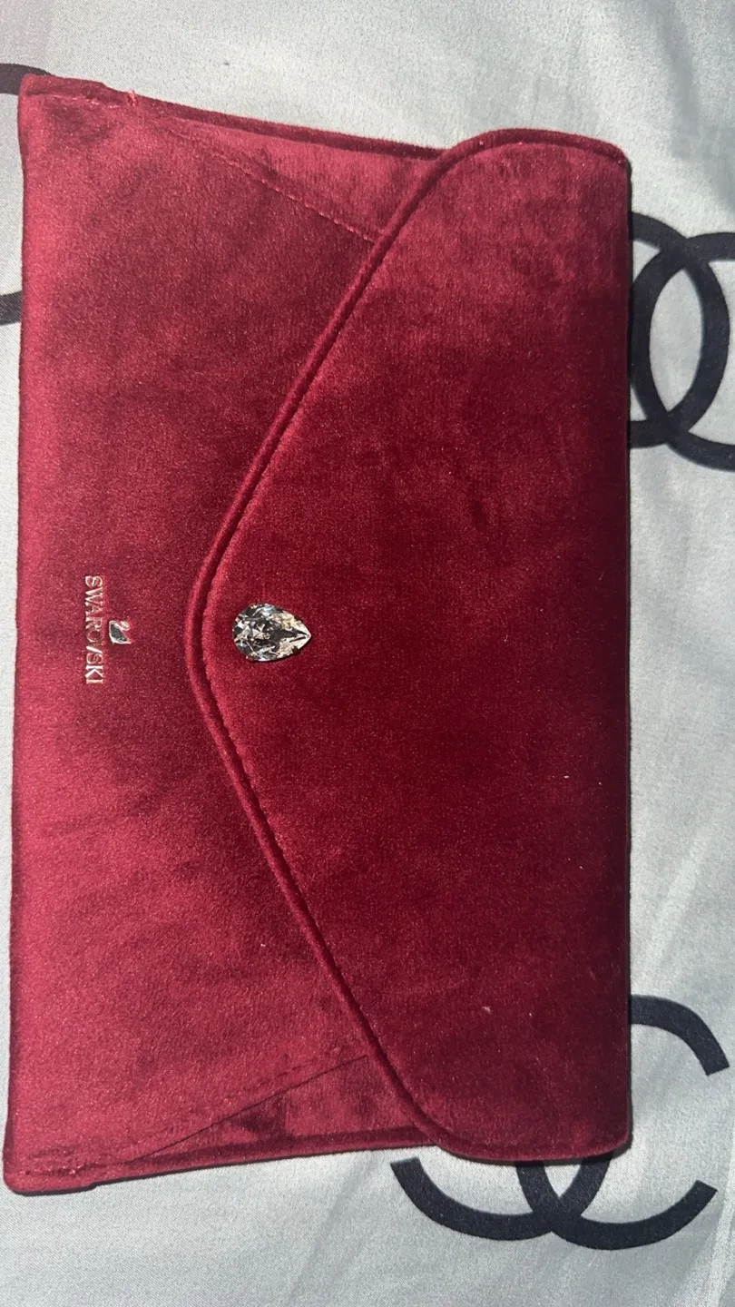 Swarovski Red Clutch & Guess Black Pouch image indicator(3)