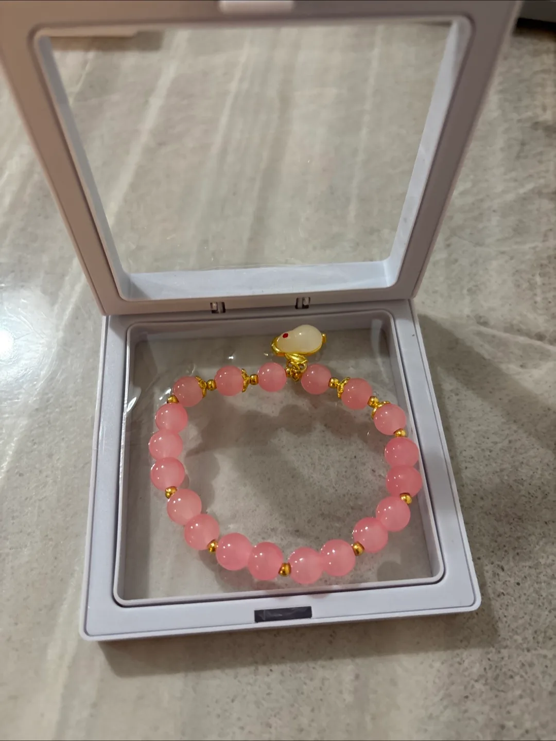 Pink Beaded Bracelet with Bunny Charm image indicator(3)