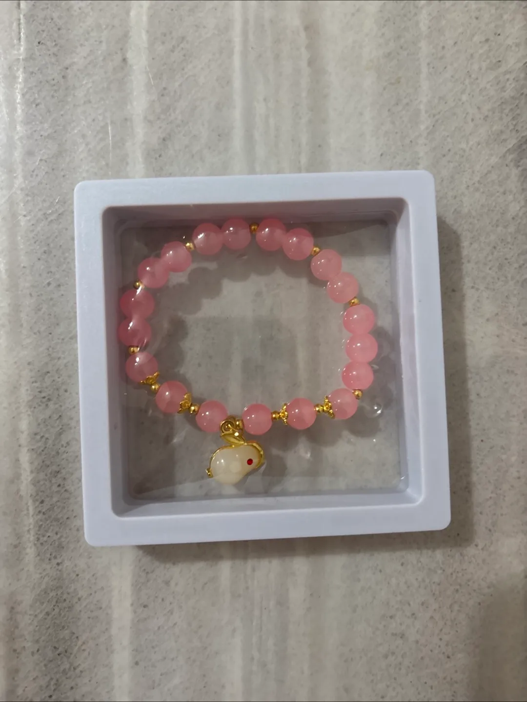 Pink Beaded Bracelet with Bunny Charm image indicator(2)