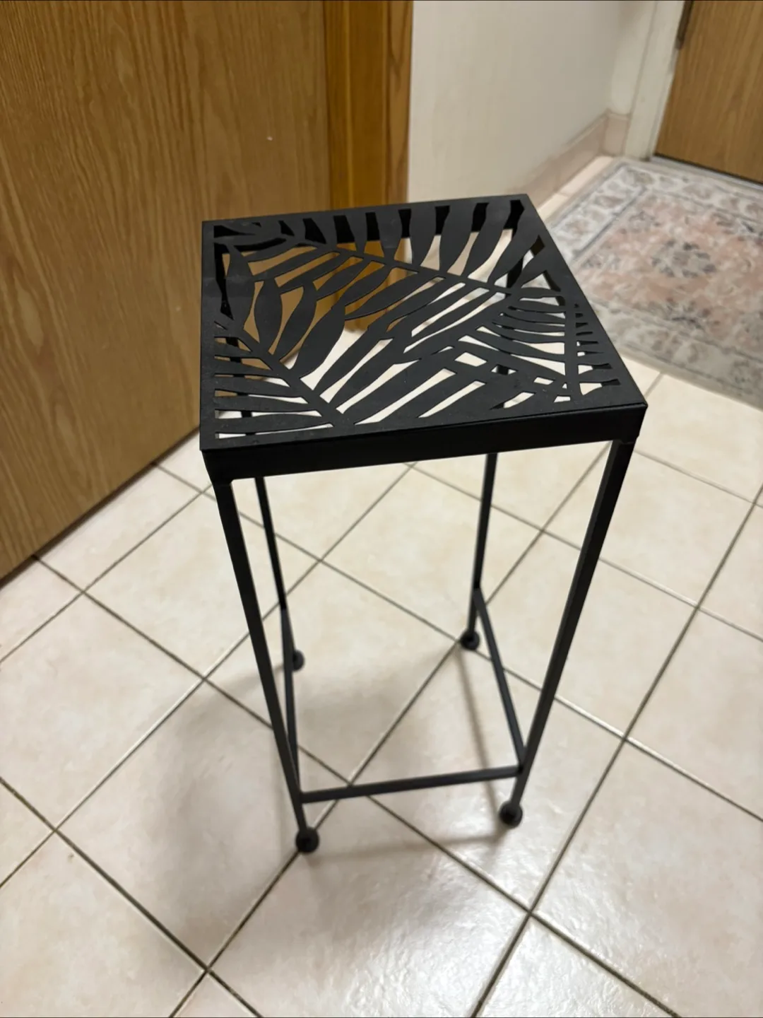 Black Metal Plant Stand with Leaf Design