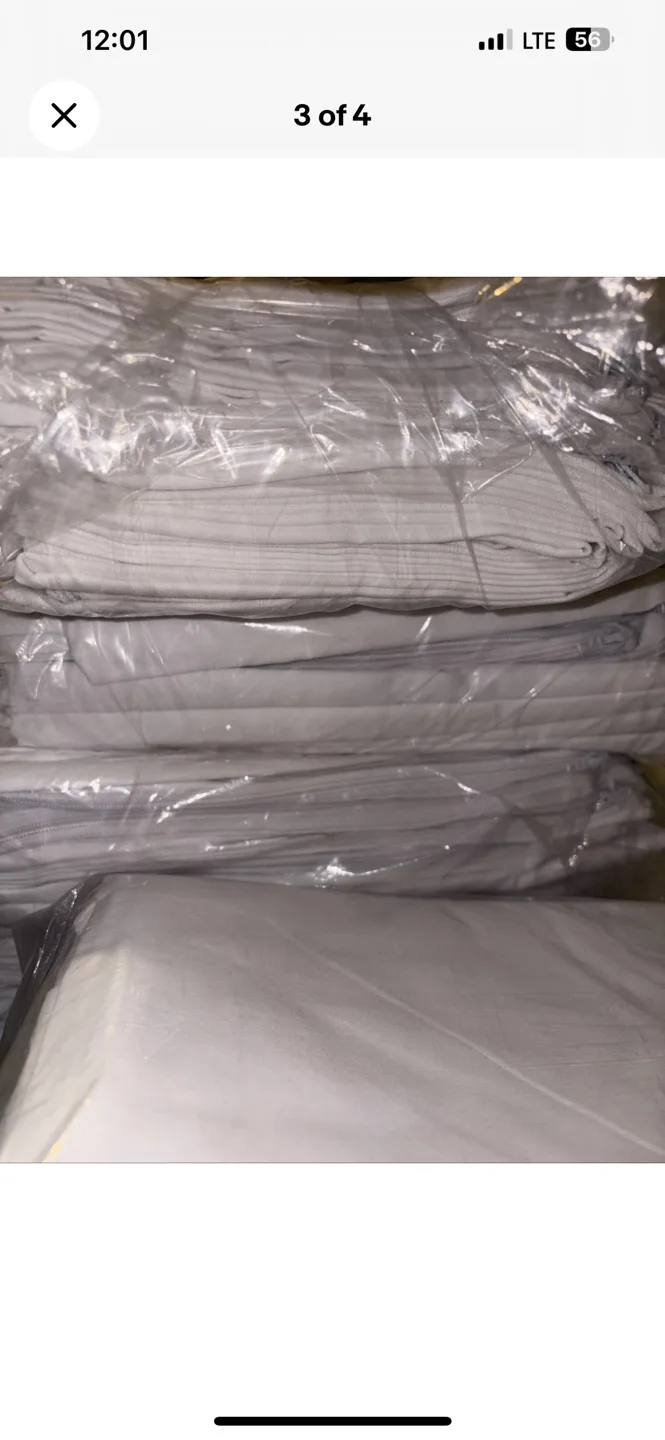 1 dozen white zippered pillowcases image indicator(4)