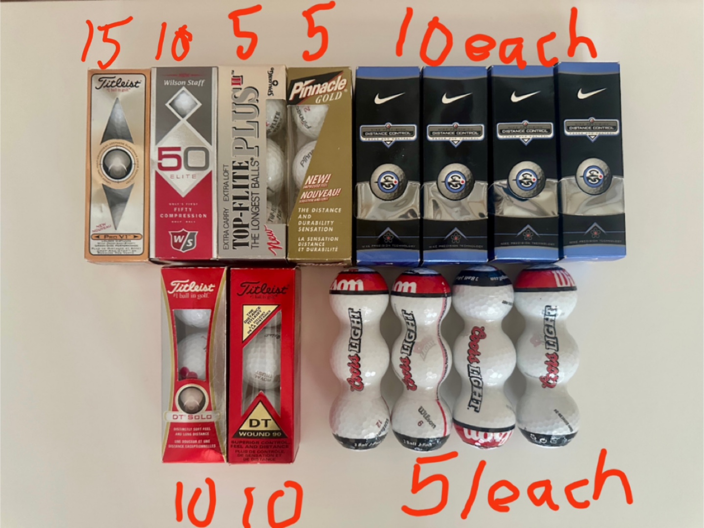 New Golf Balls: Titleist, Wilson, Pinnacle, Nike, Coors Light