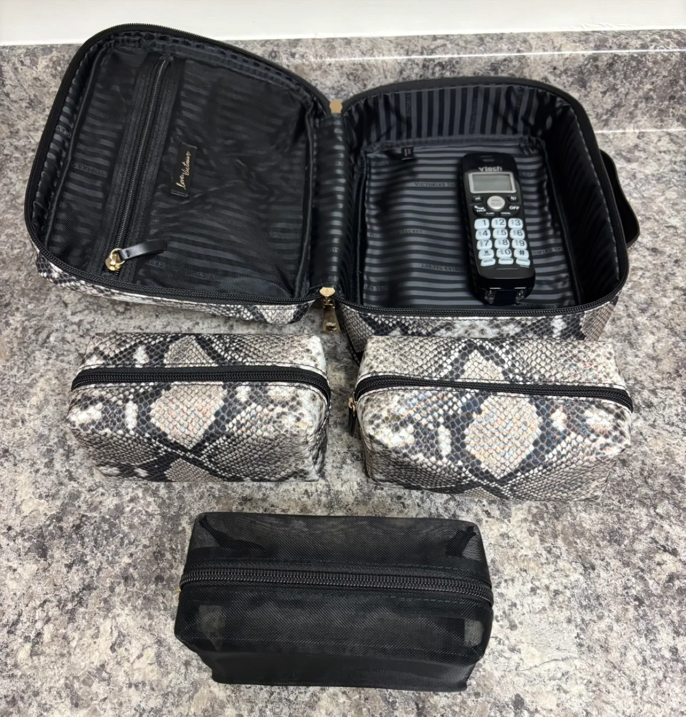 Victoria's Secret Snakeskin Print Travel Case image indicator(3)