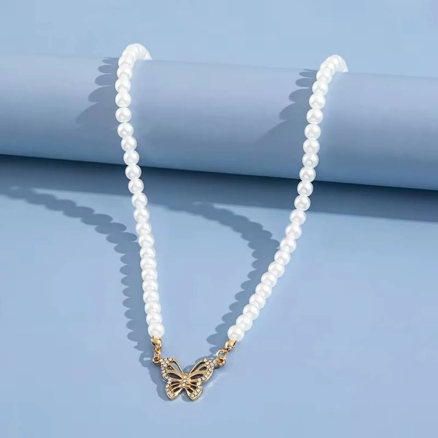 Pearl and Butterfly Necklace , Urban Outfitters thumbnail