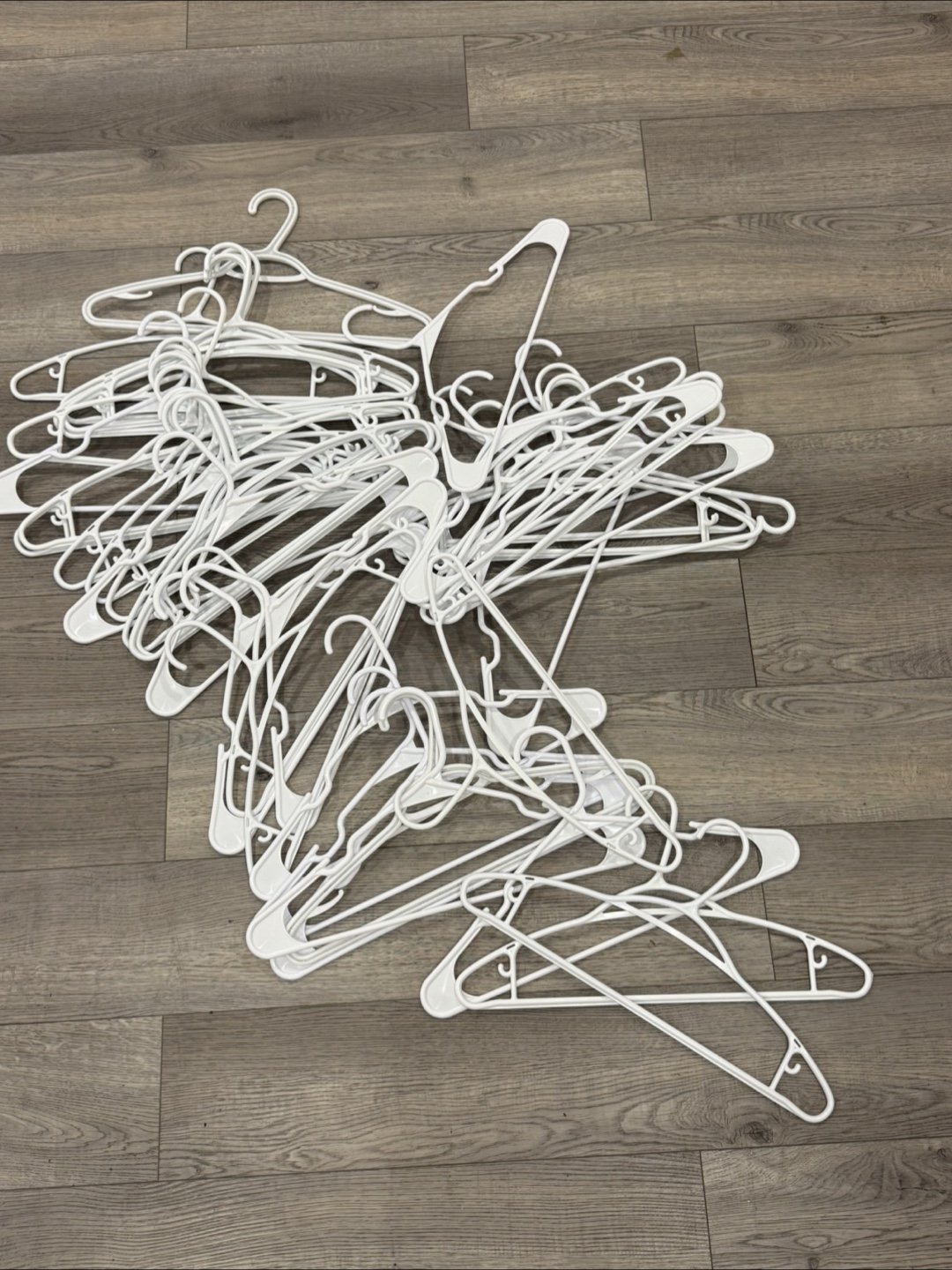 45 White Plastic Hangers