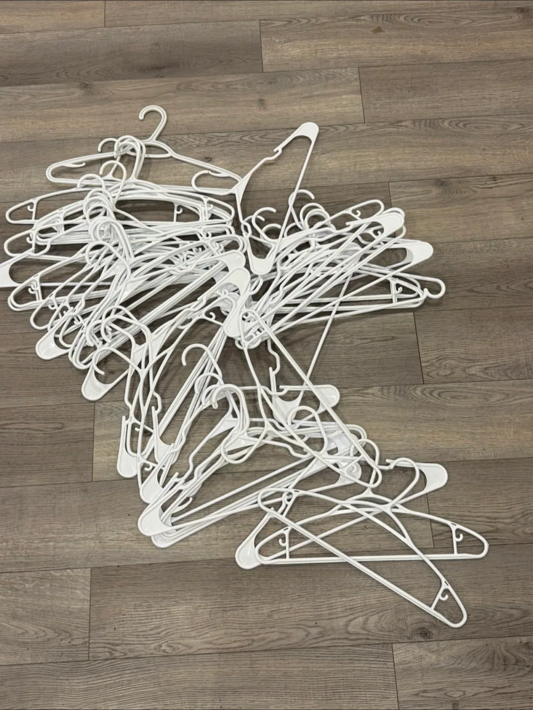 45 White Plastic Hangers thumbnail