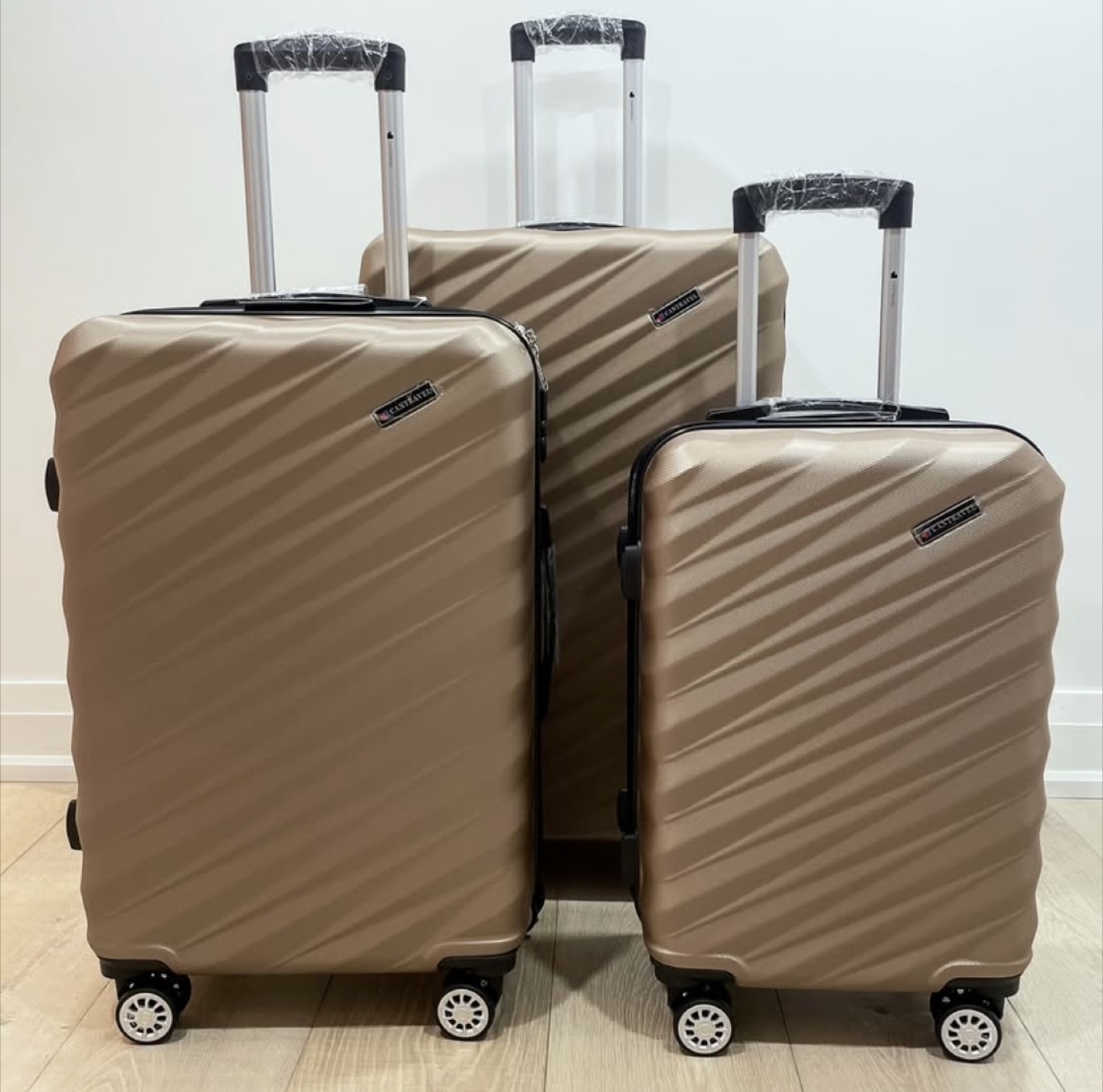 Brand new 3-Piece Luggage Set (20”/24”/28”) - Gold