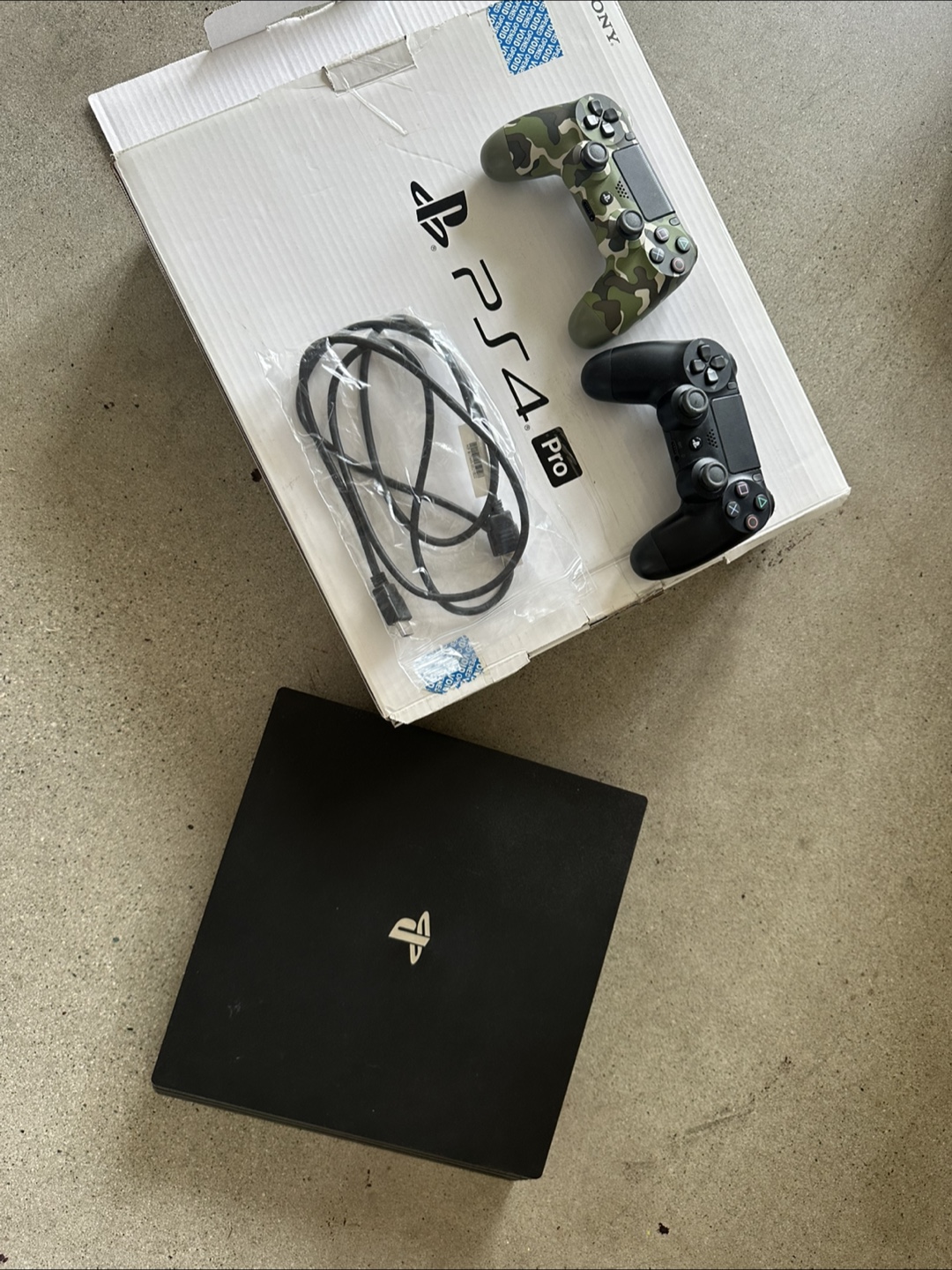 PlayStation 4 Pro Console with 2 Controllers