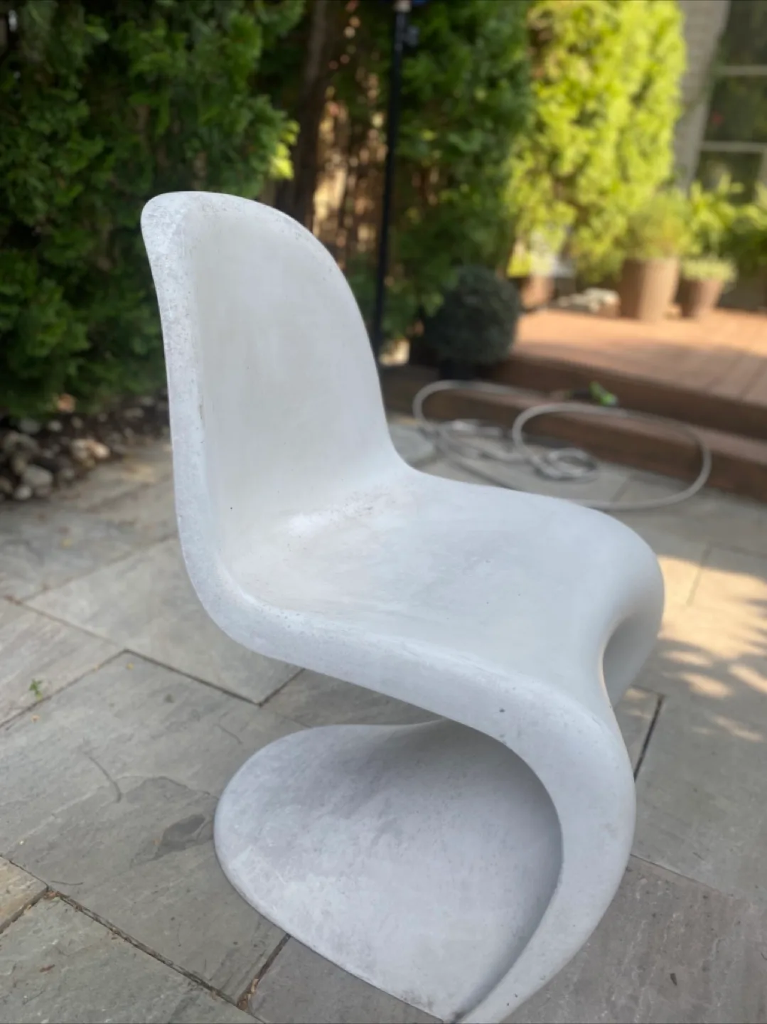 8 white Vitra Panton patio chairs image indicator(2)