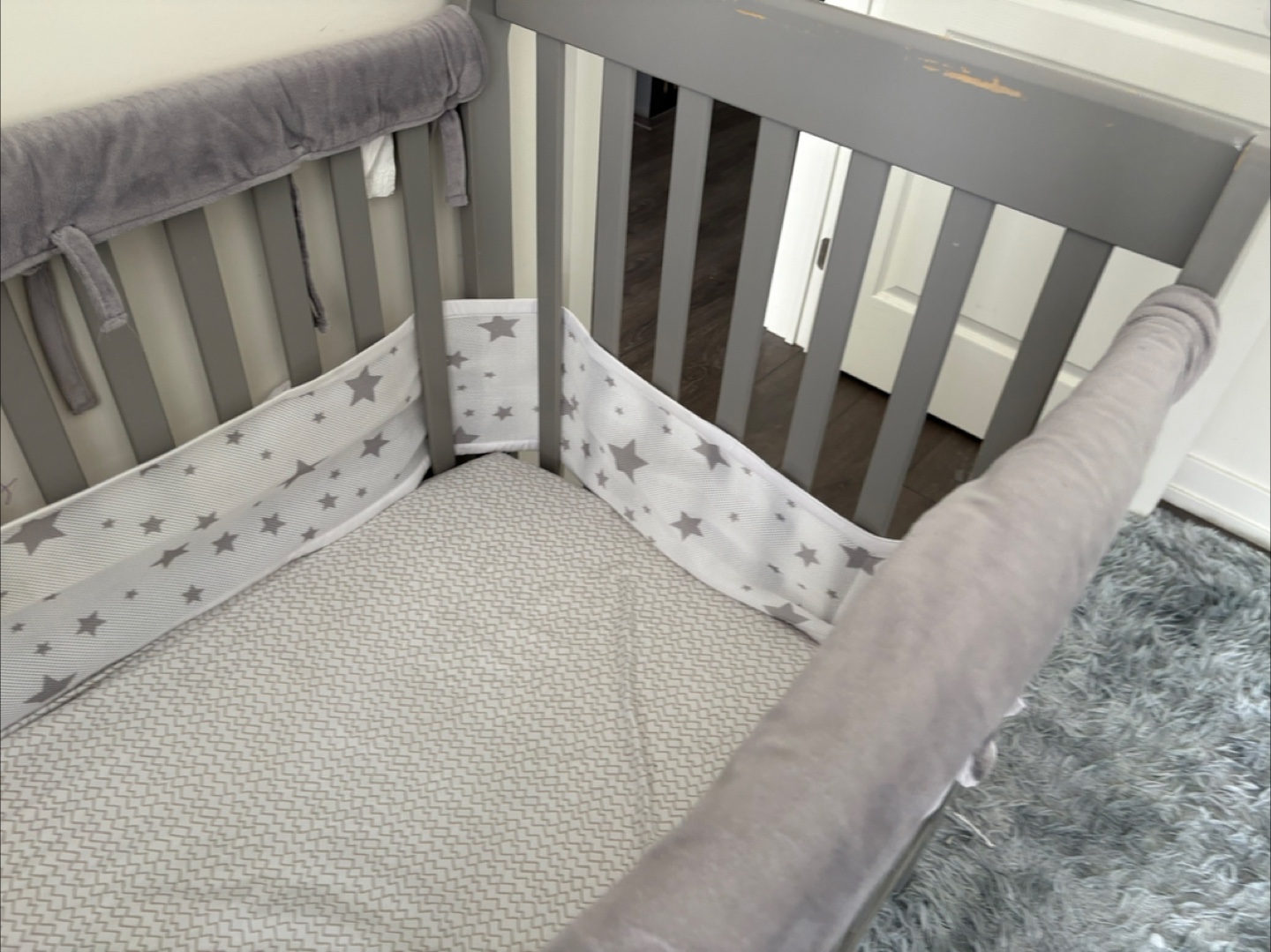 Grey Baby Crib with Bumper Pads