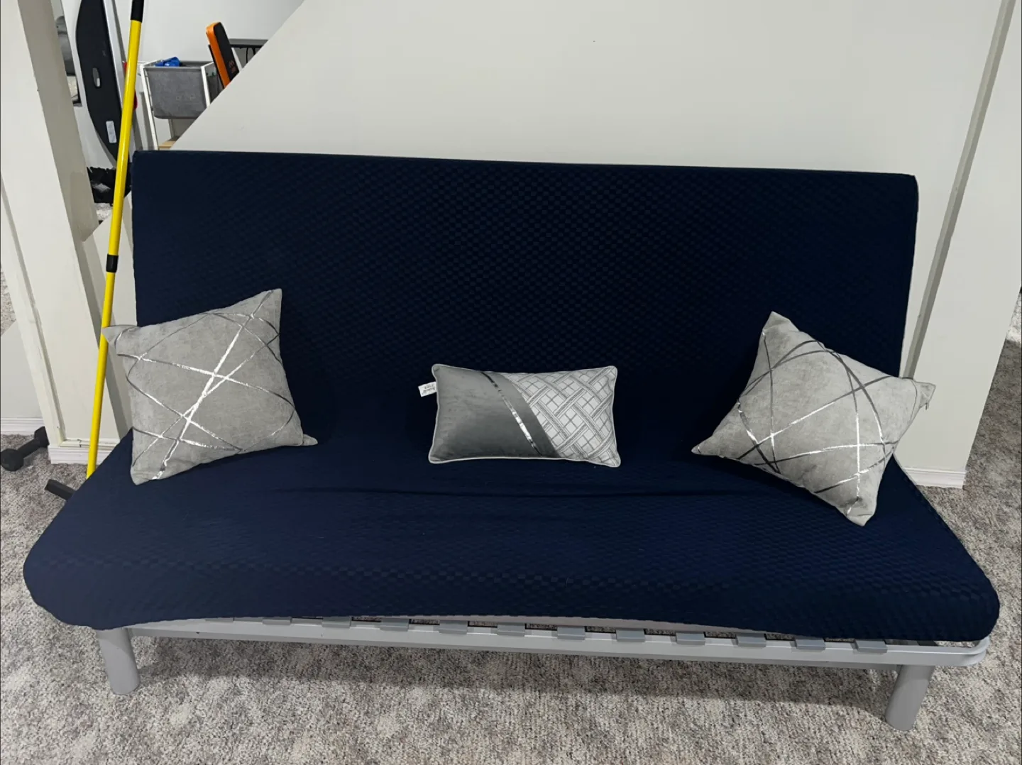 Beautiful Futon with Navy Blue Cover and pillows thumbnail