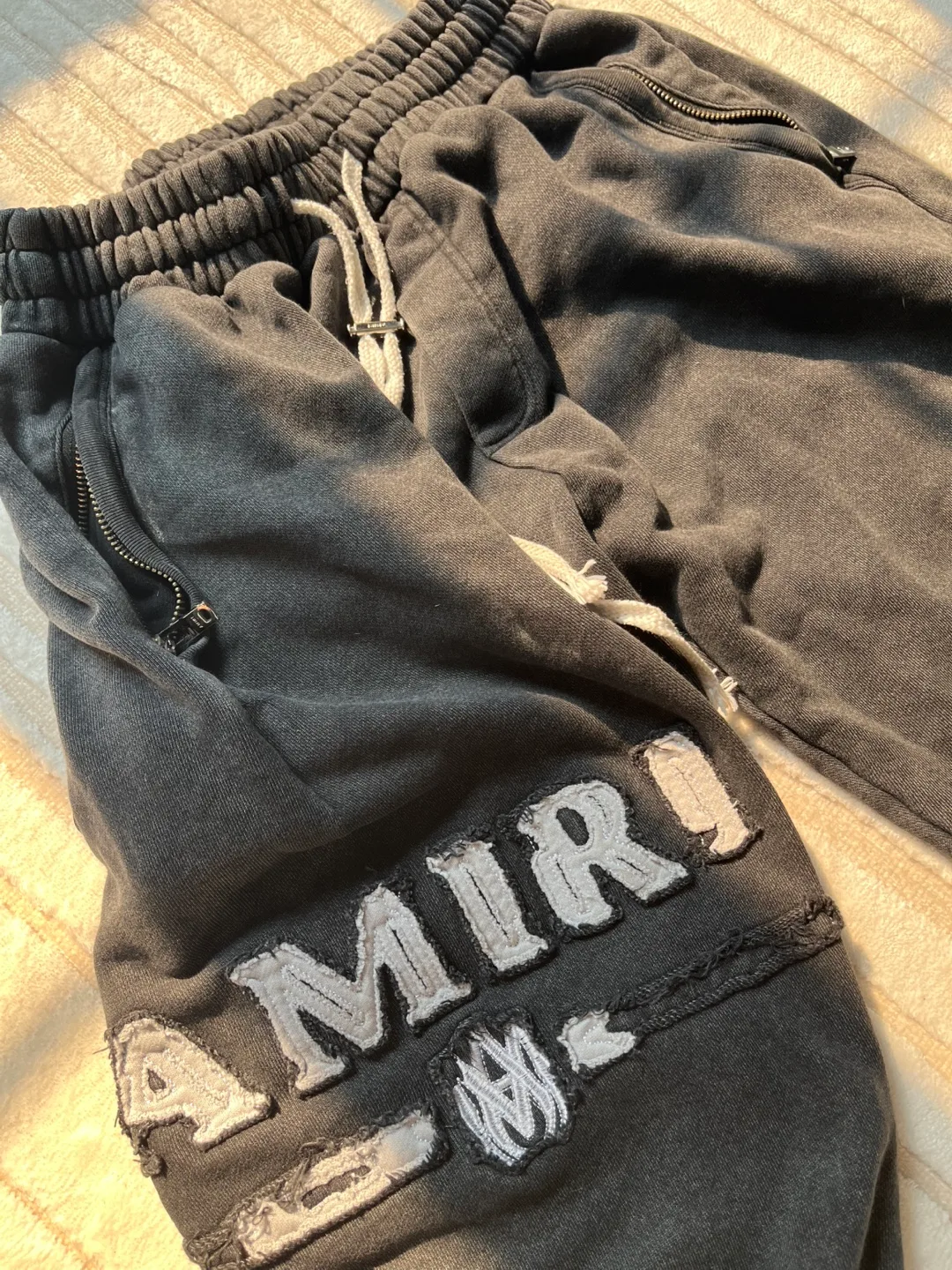 AMIRI Distressed Logo Sweatpants image indicator(2)