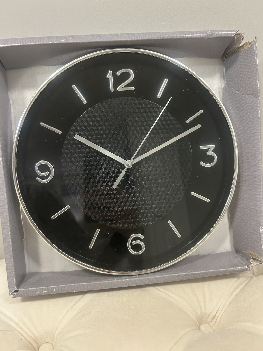 Black Wall Clock with Silver Accents