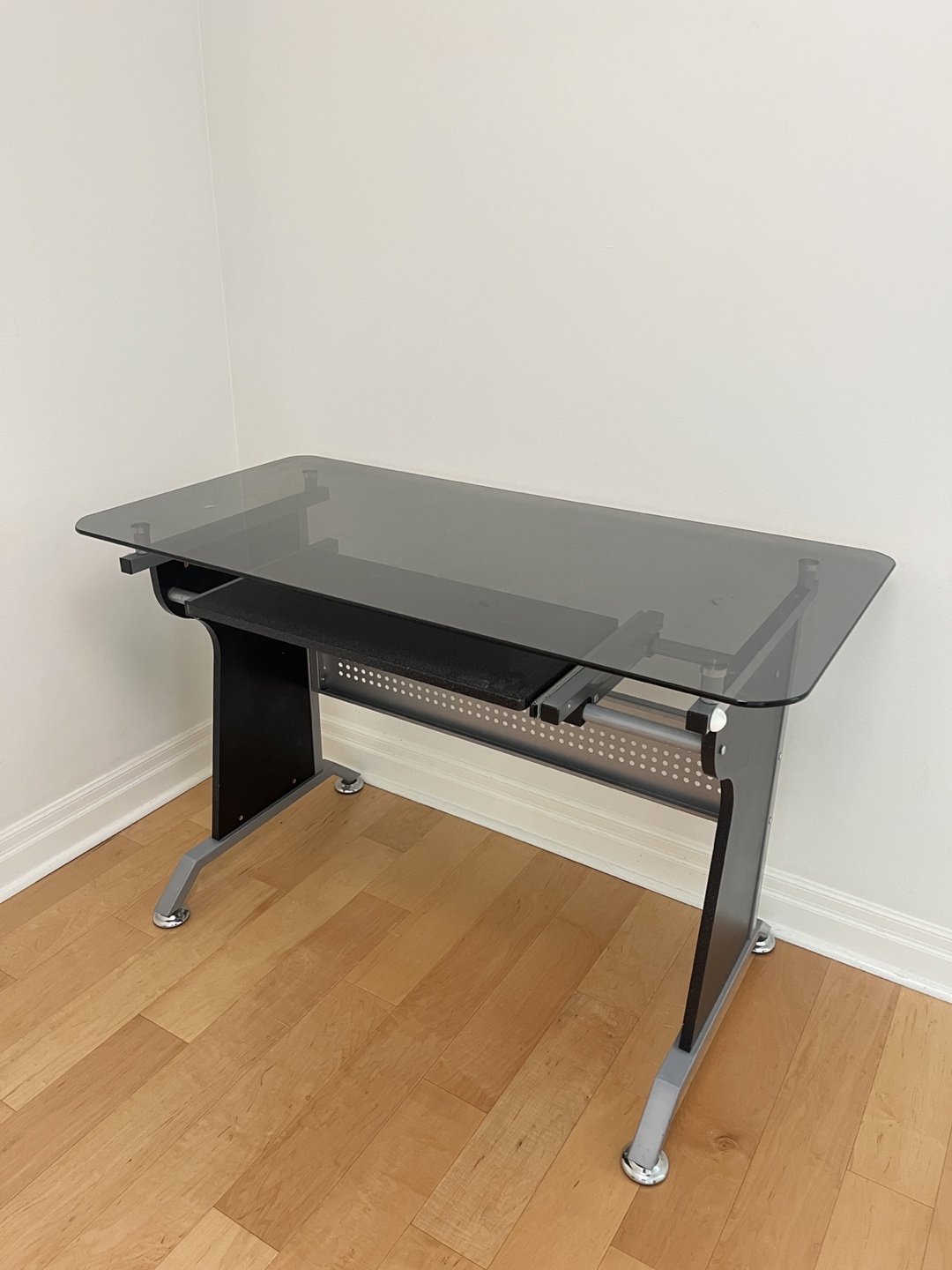 Glass desk with slide out table