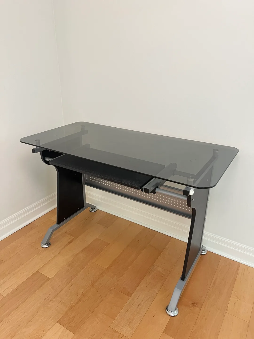 Glass desk with slide out table