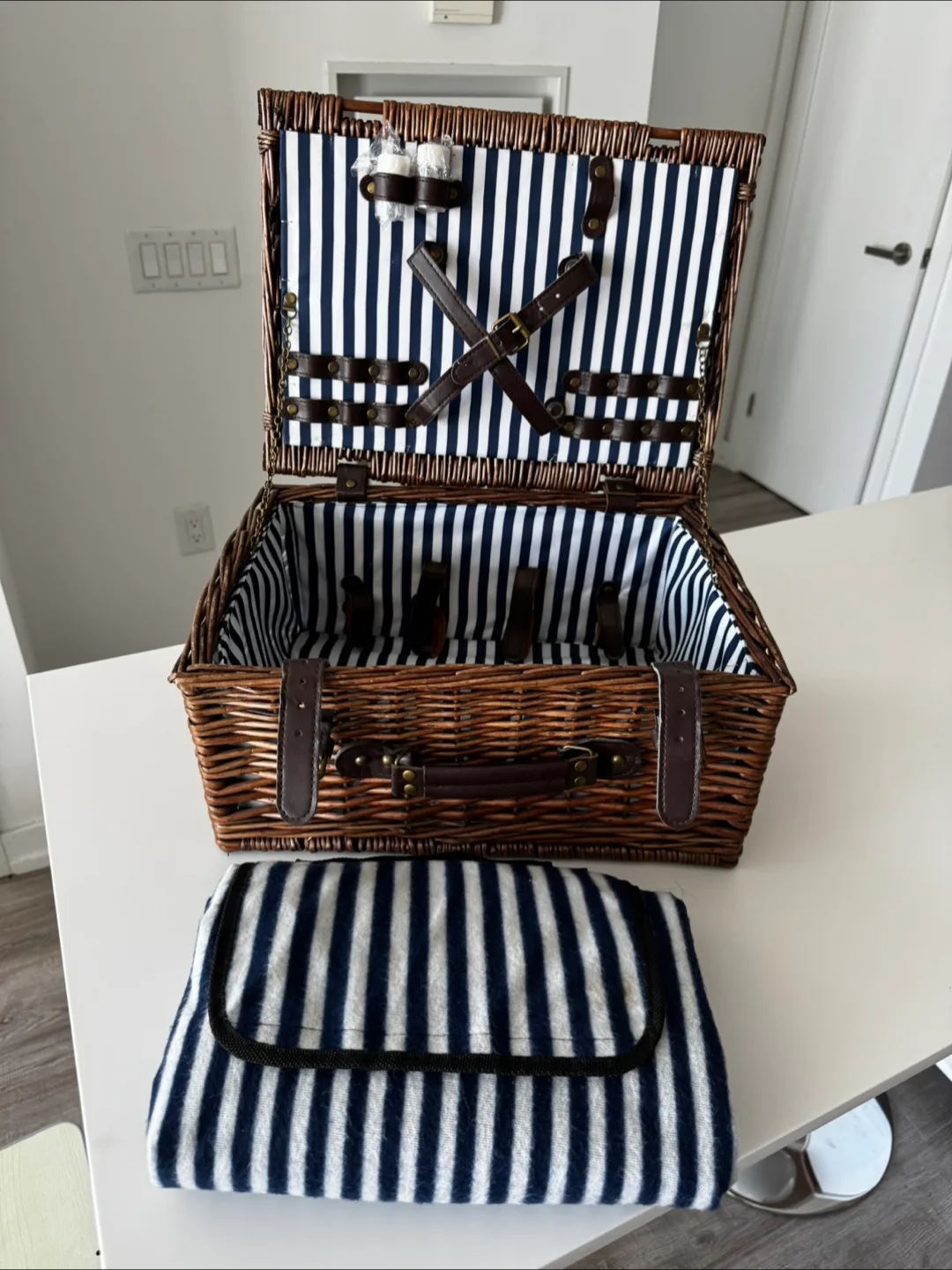 Wicker wood picnic basket with blanket thumbnail
