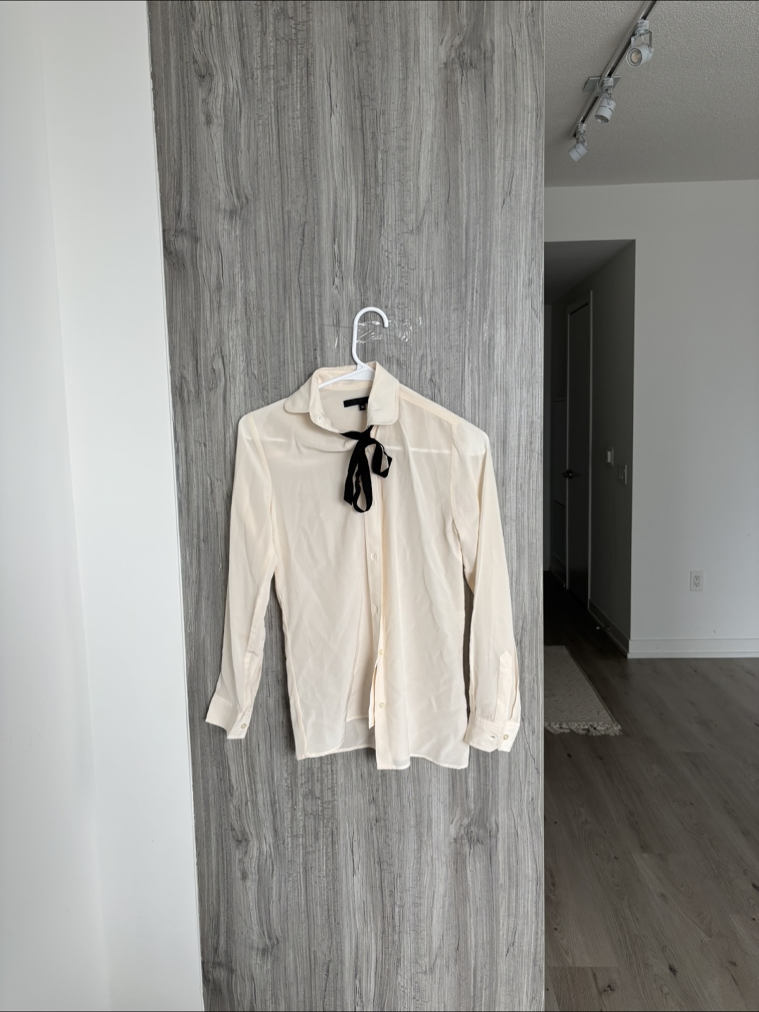 Cream Blouse with Black Bow