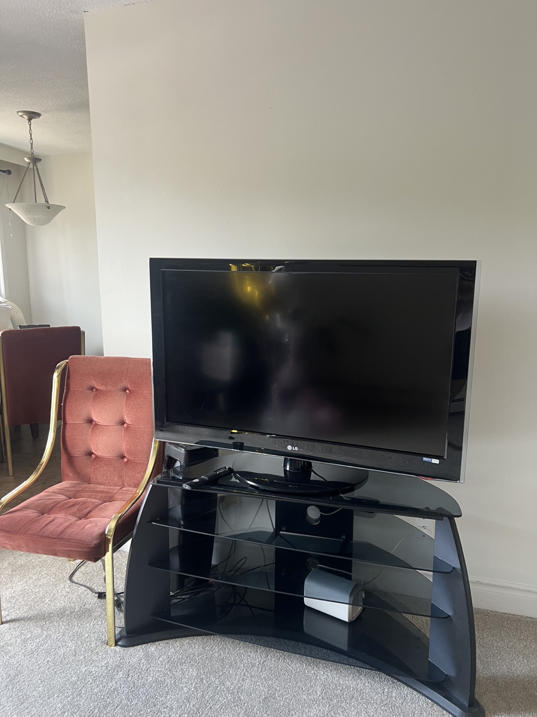 LG TV on Black Stand