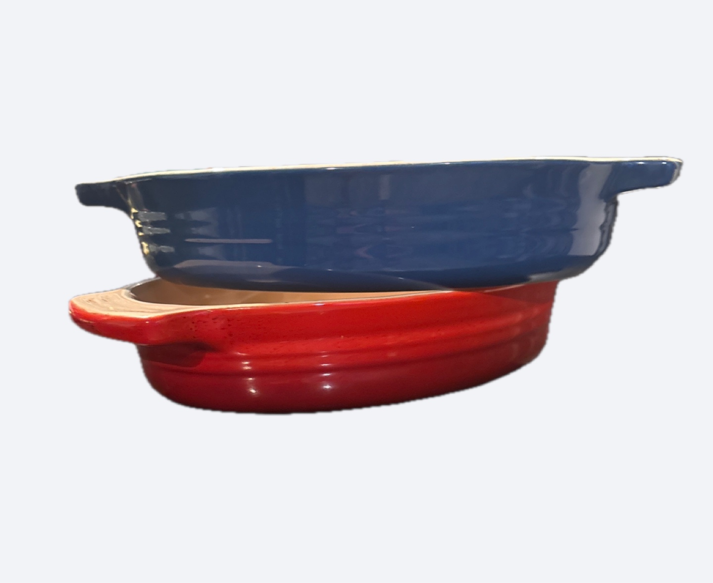 Red and Blue Le Creuset Ceramic Baking Dishes