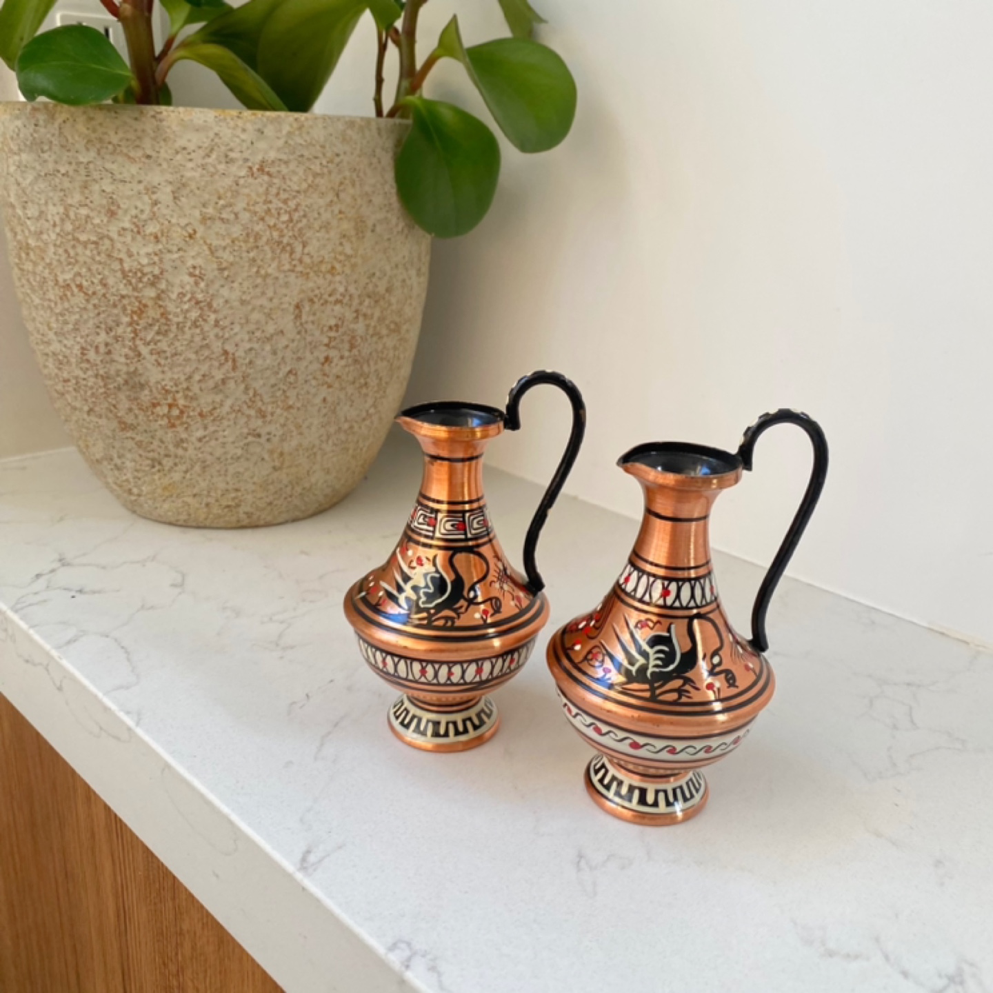 Two Vintage Decorative Copper Pitchers