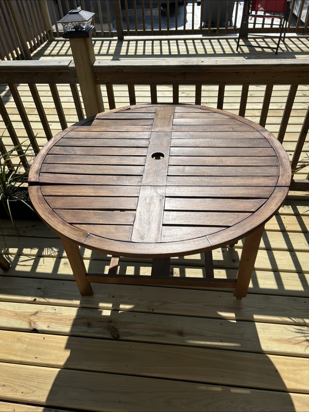 Wooden outdoor table (plus chairs)