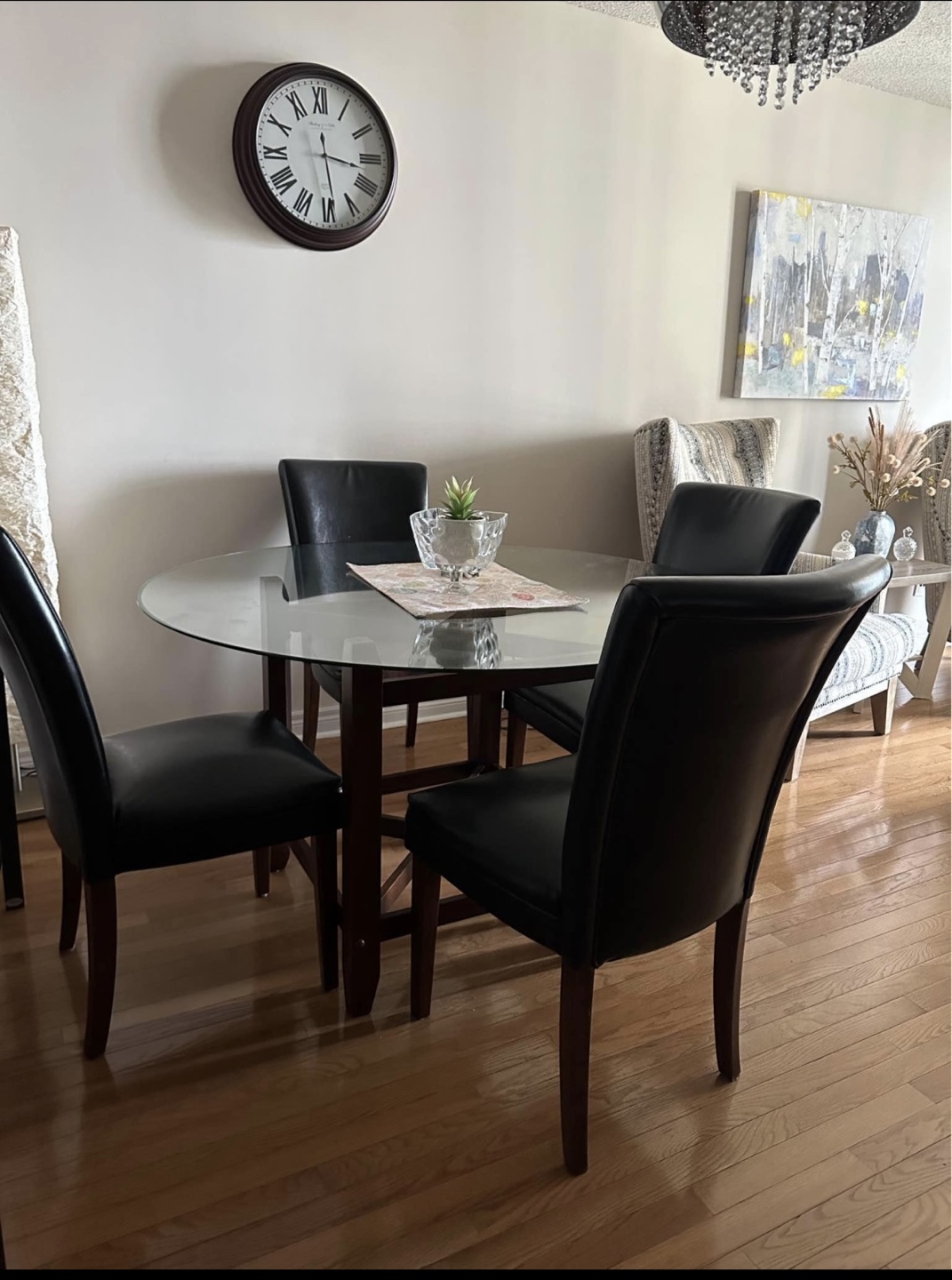 Round Glass Dining Table with 4 Black Chairs