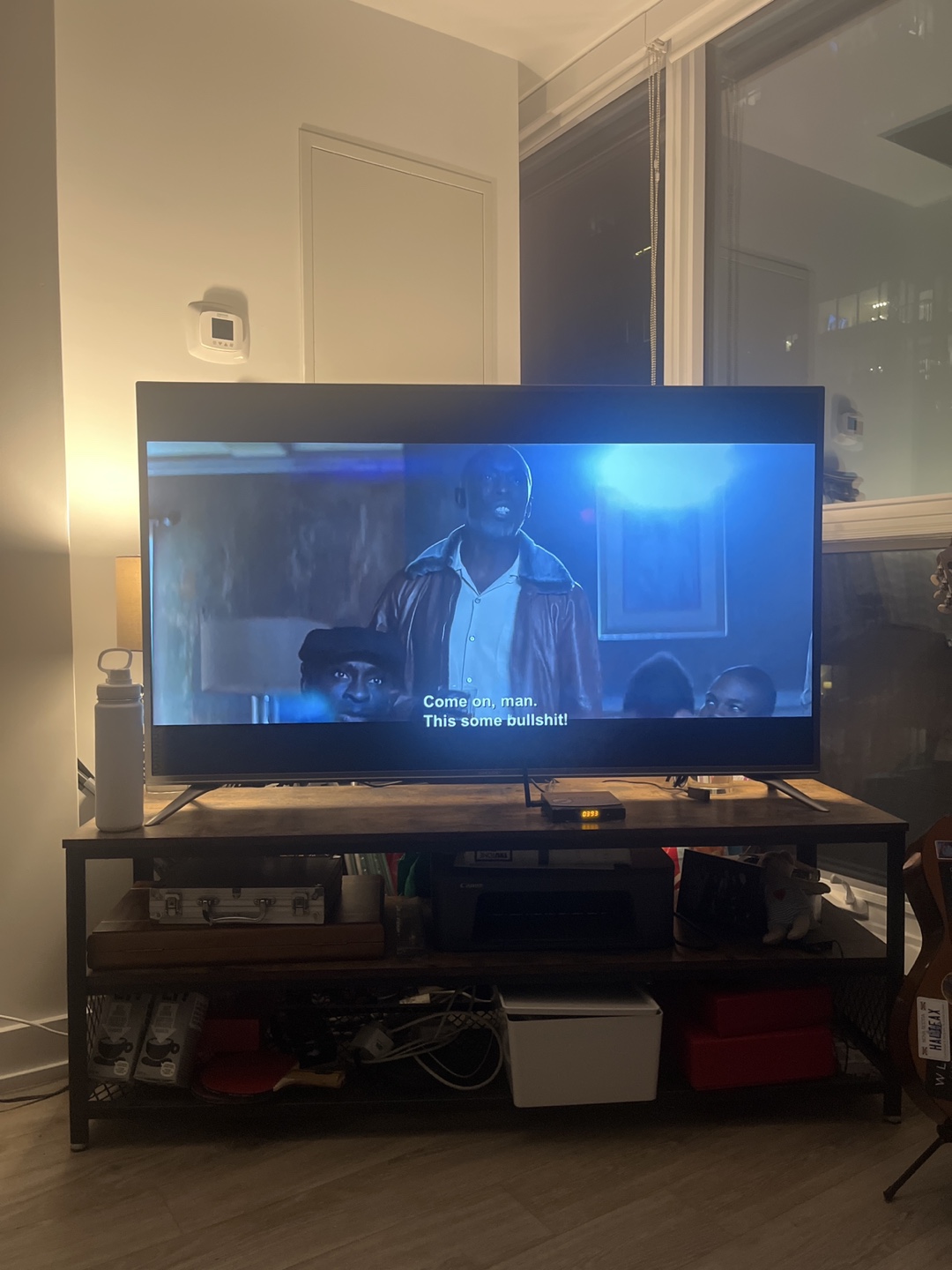 TV stand and 55 inch Sharp Smart LED TV - LC-55N7000U