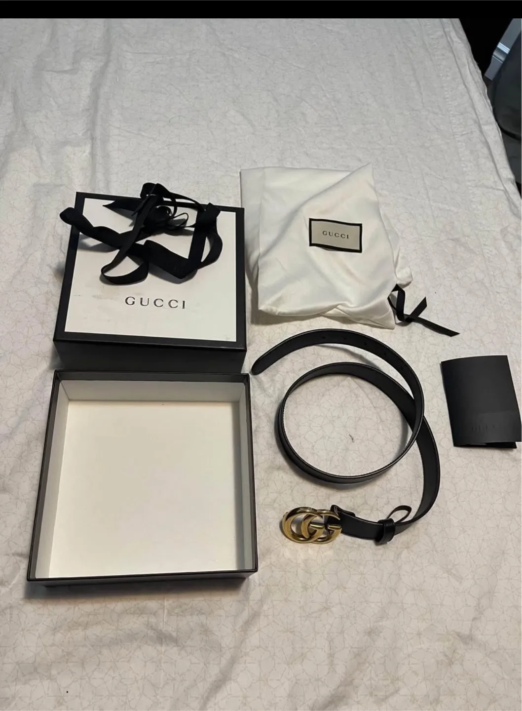 Gucci Black Leather Belt with Gold GG Buckle image indicator(2)