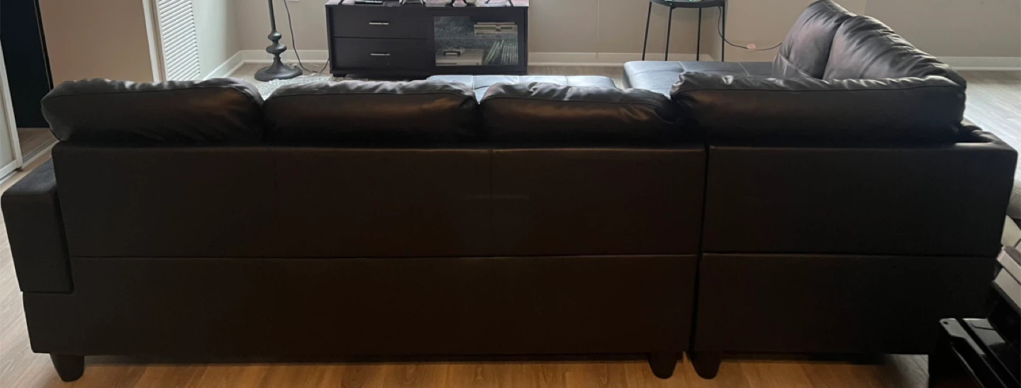 Black Leather Sectional Sofa with Ottoman - photo 4