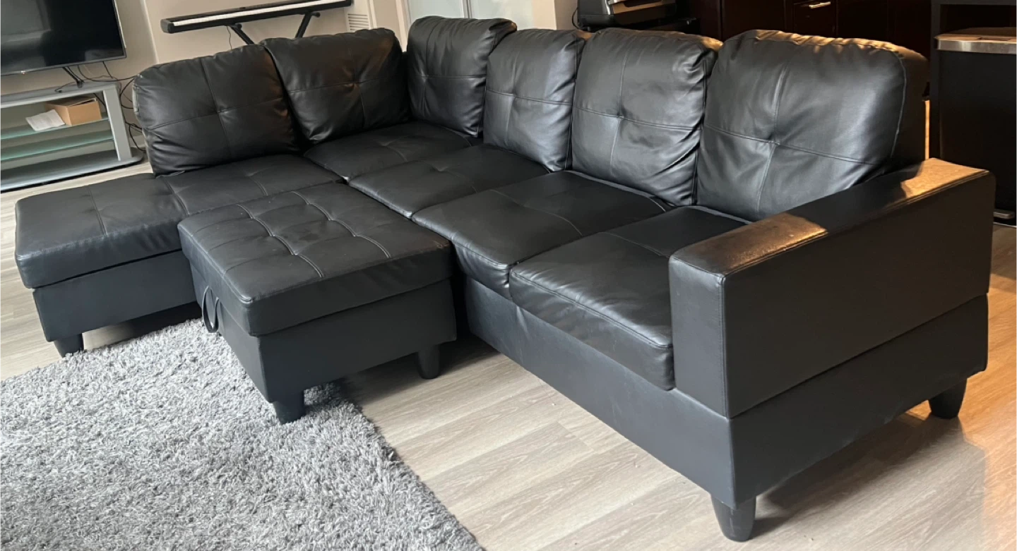 Black Leather Sectional Sofa with Ottoman