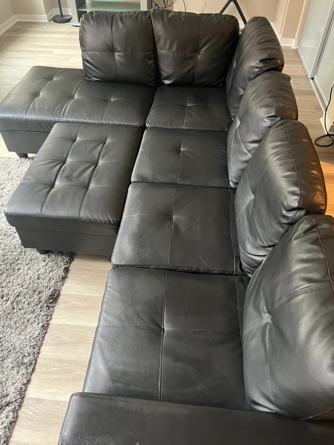 Black Leather Sectional Sofa with Ottoman - photo 2