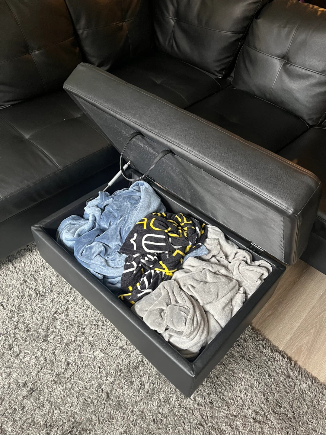 Black Leather Sectional Sofa with Ottoman - photo 3