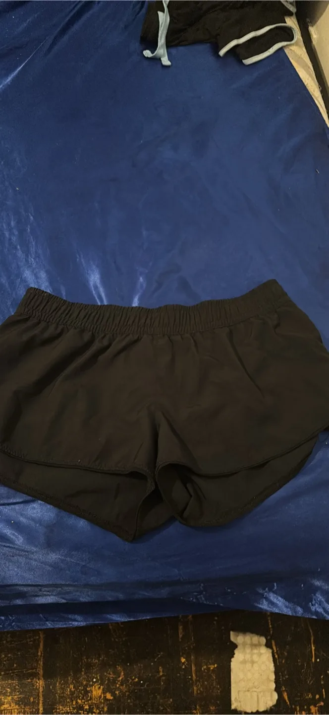 Black swim shorts thumbnail