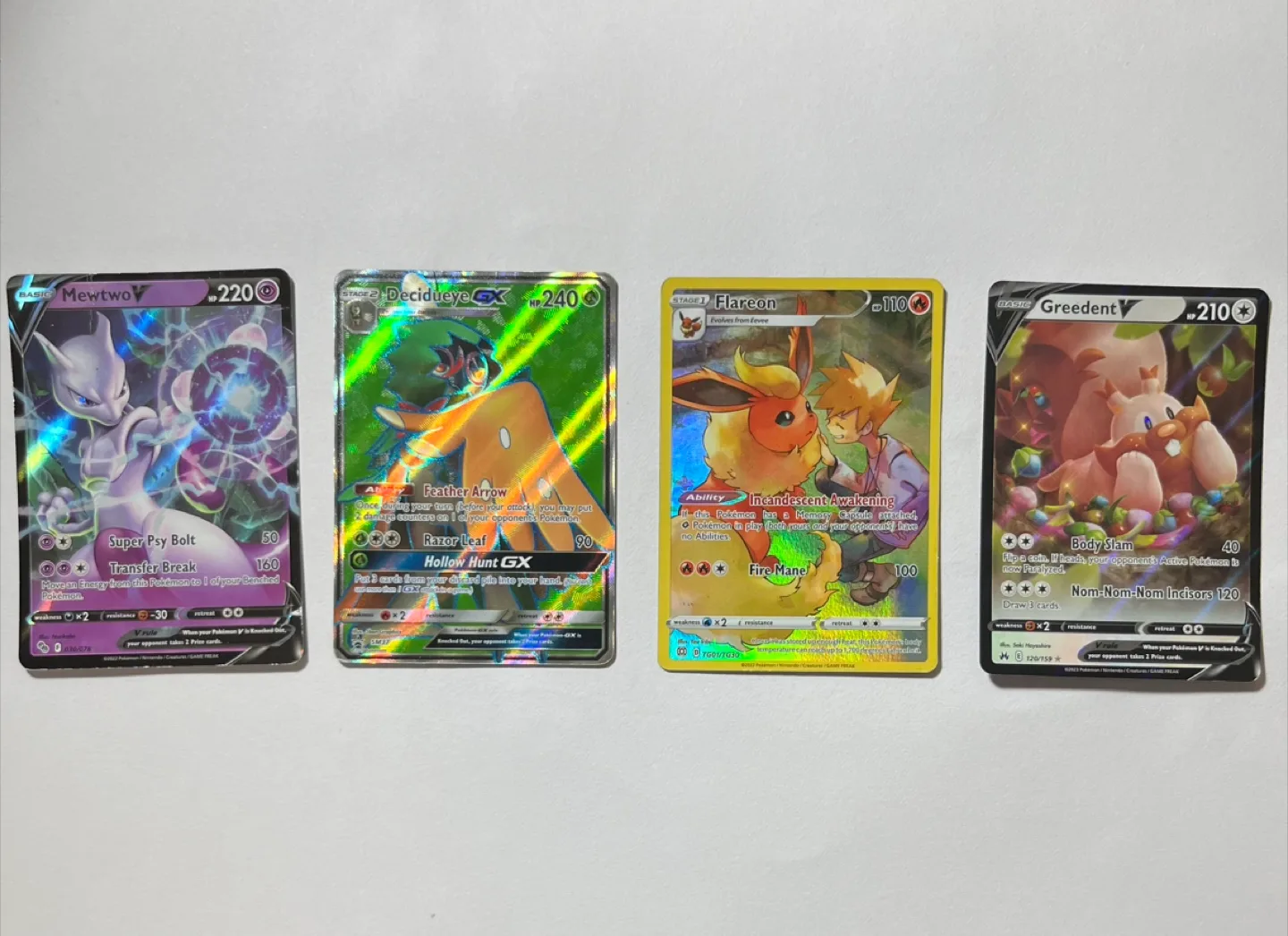 4 Ultra Rare Pokémon Cards image indicator(2)