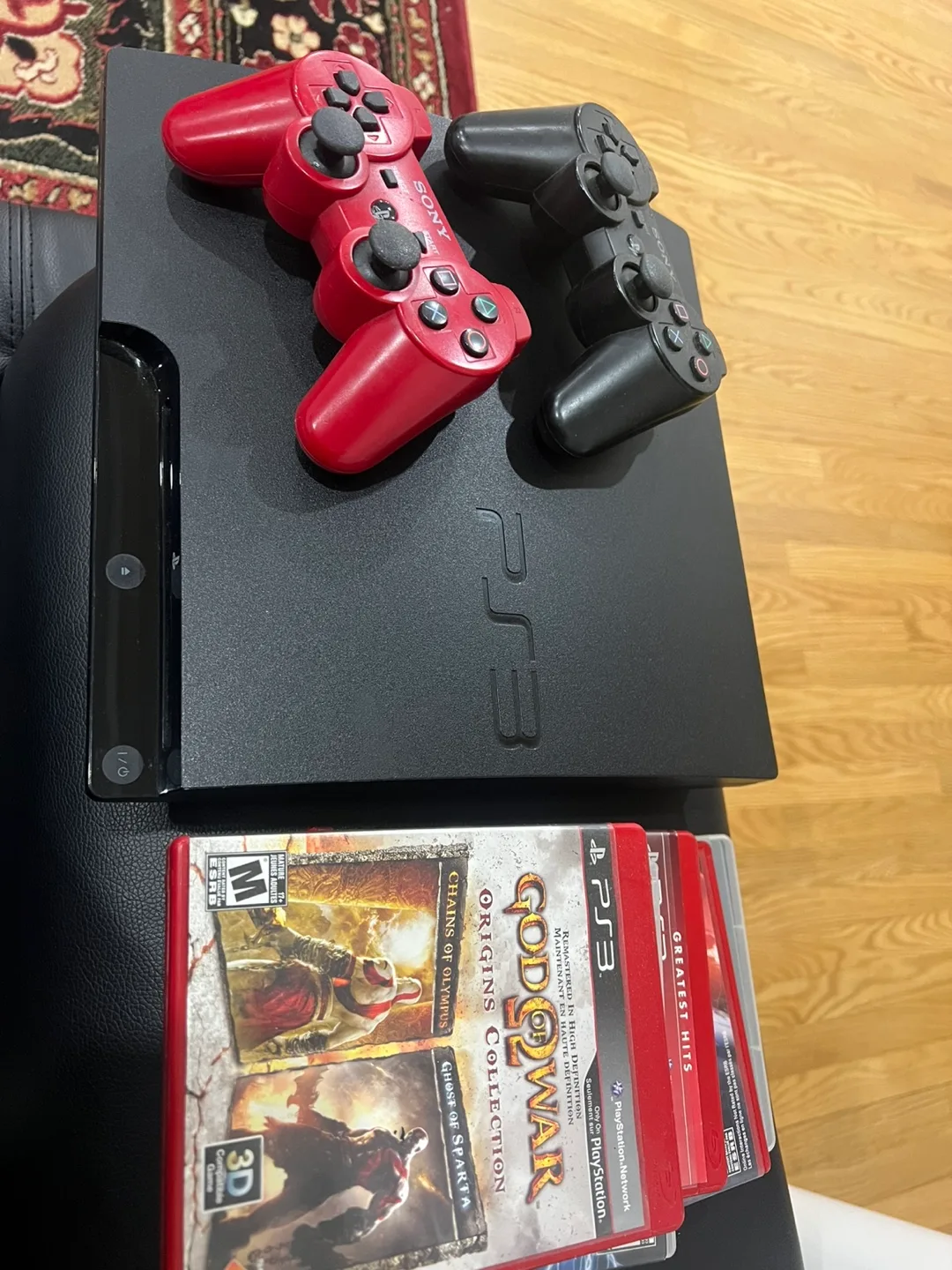 Sony PlayStation 3 with Games and Controllers image indicator(2)