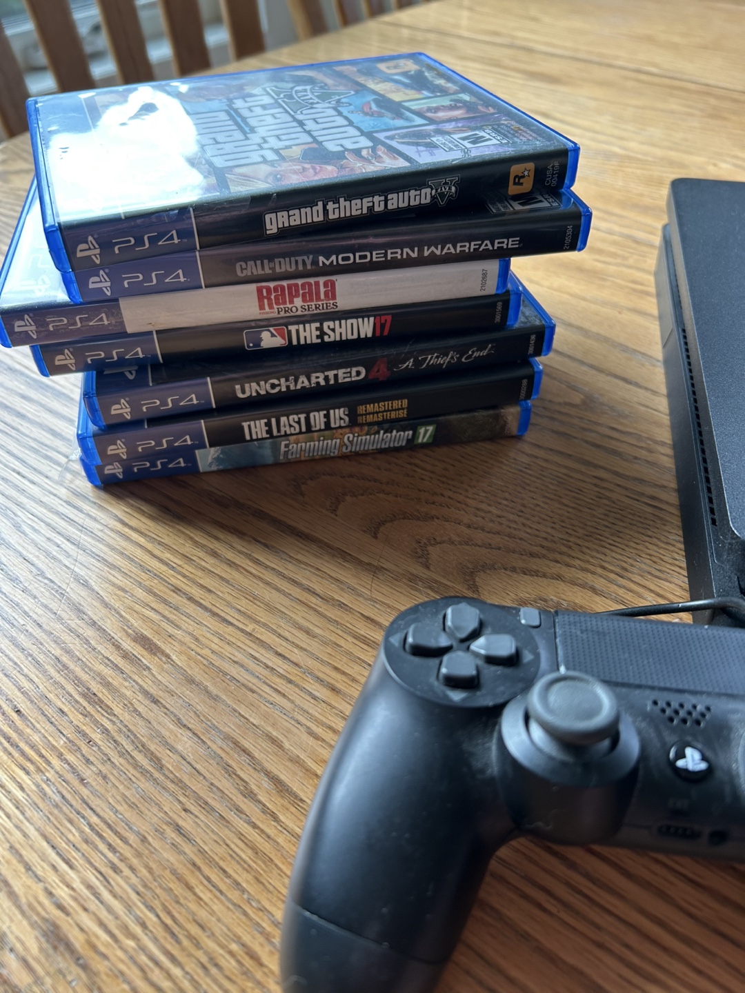 PlayStation 4 with Games and Controllers - photo 2