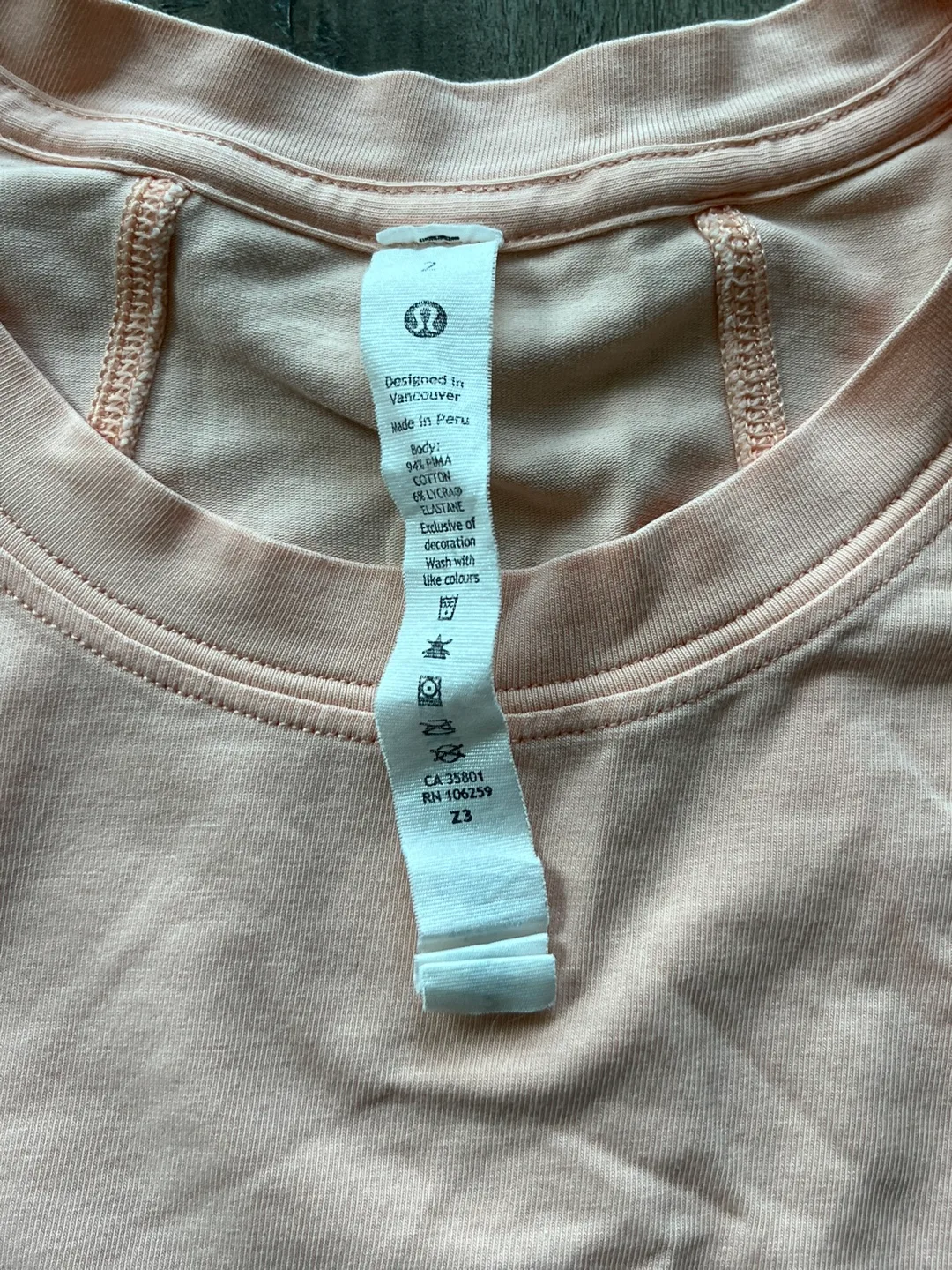 Lululemon size 2 cropped t shirt. NWOT image indicator(3)