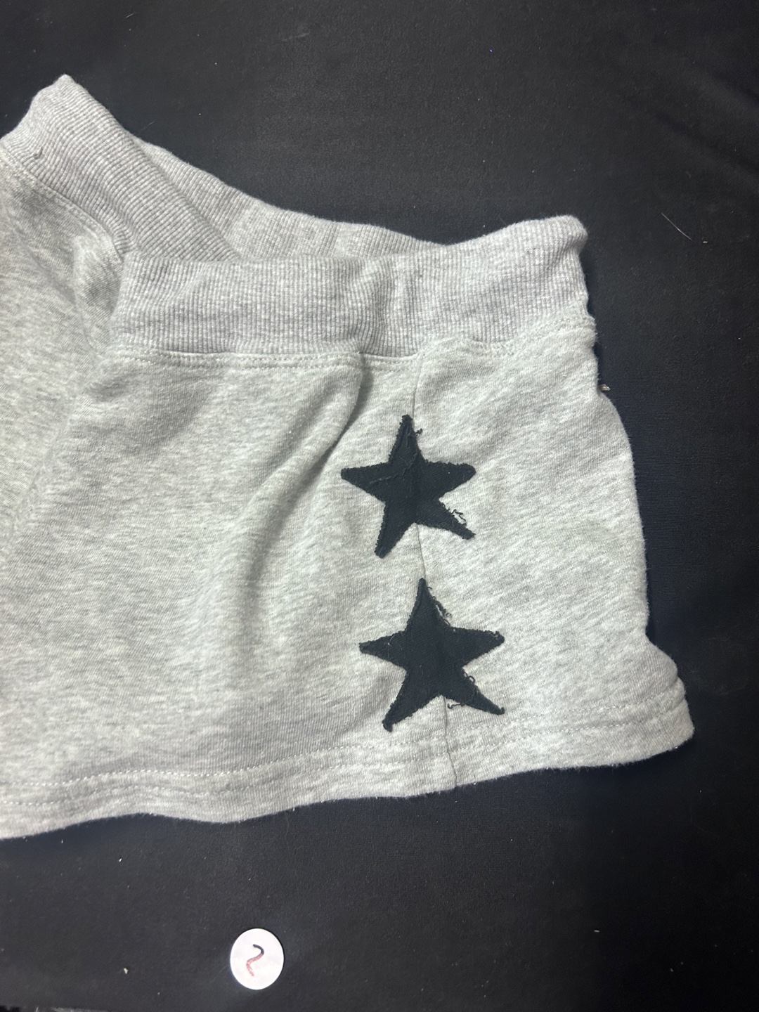 Grey shorts with star design - photo 3