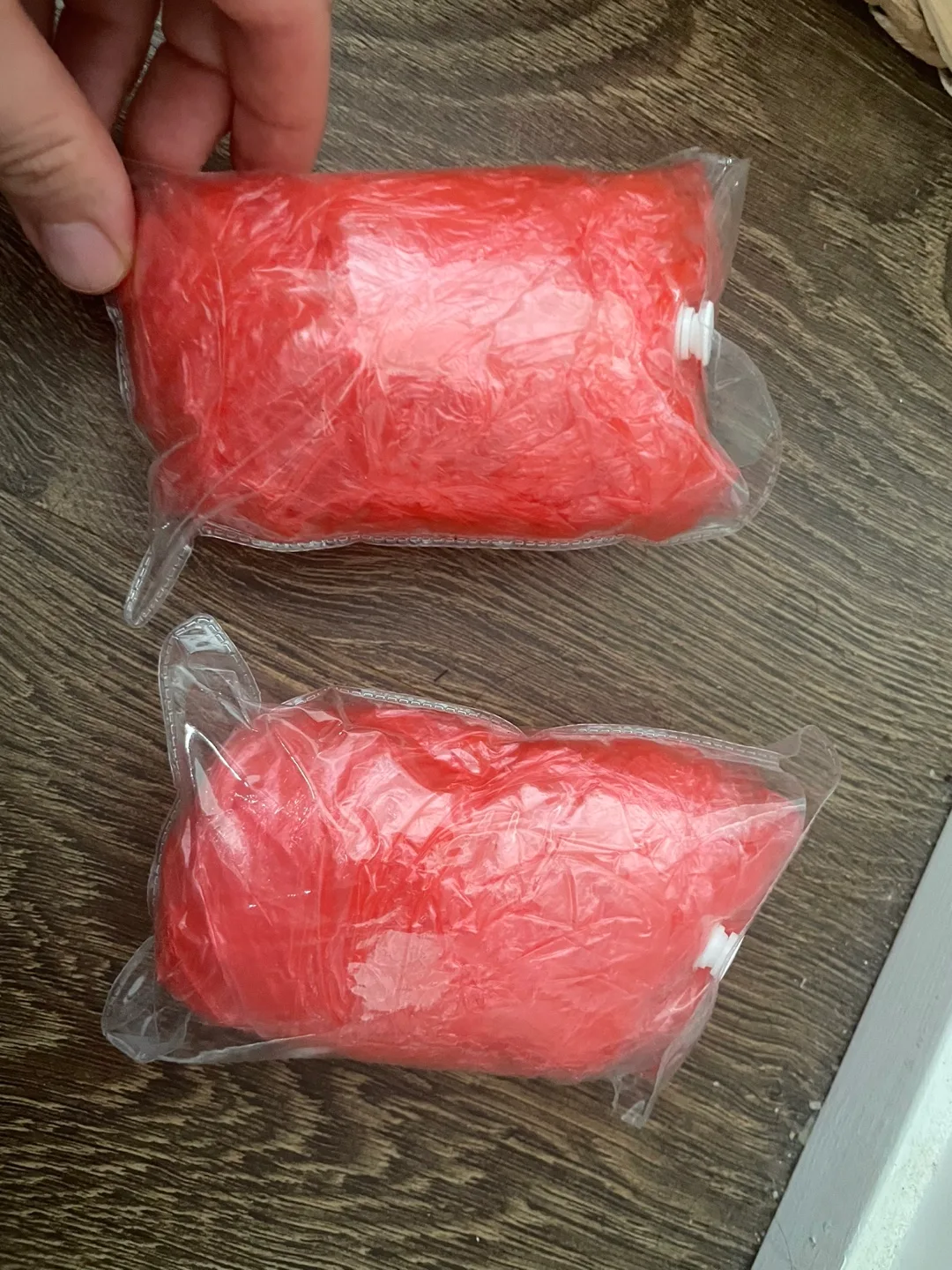 Red plastic raincoats thumbnail