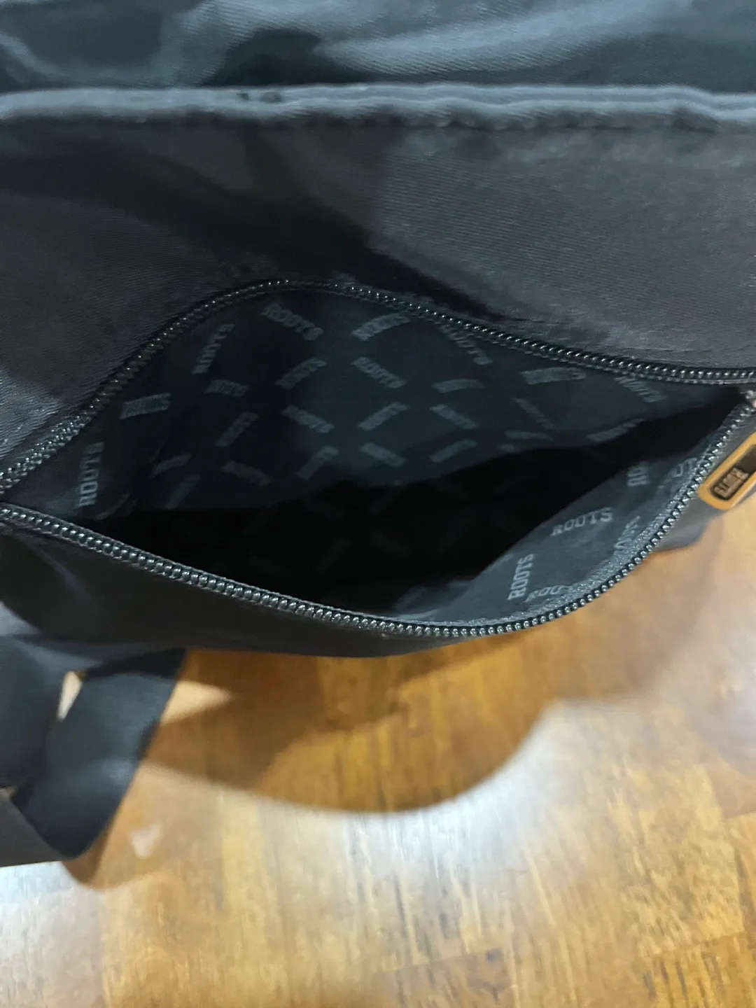 Roots Black Crossbody Bag image indicator(4)