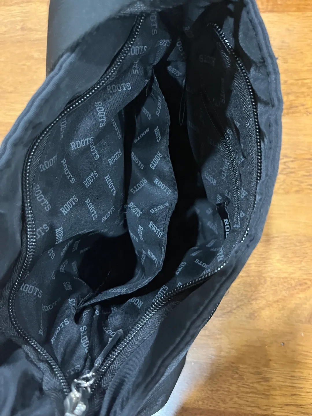 Roots Black Crossbody Bag image indicator(3)