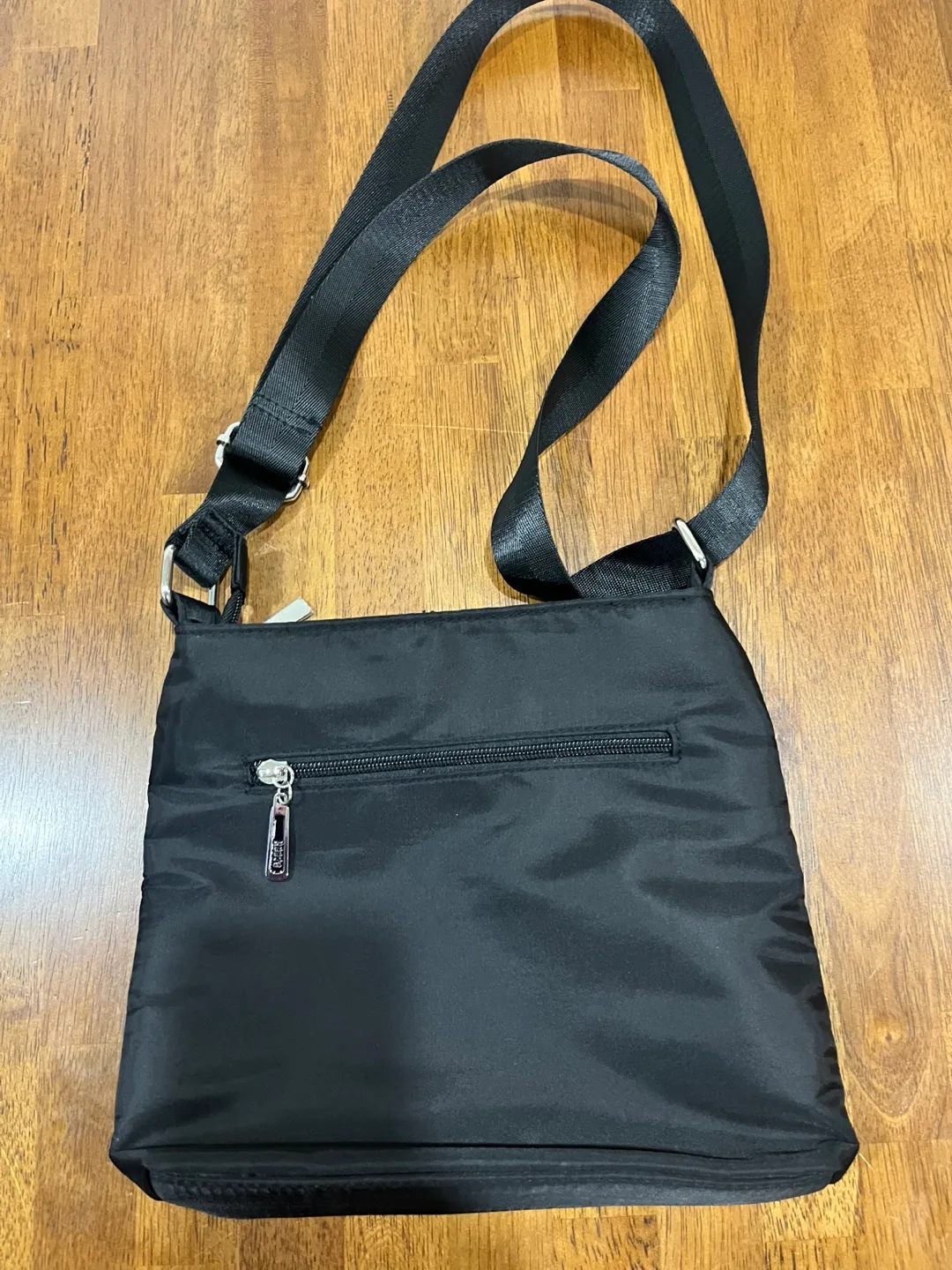 Roots Black Crossbody Bag image indicator(2)