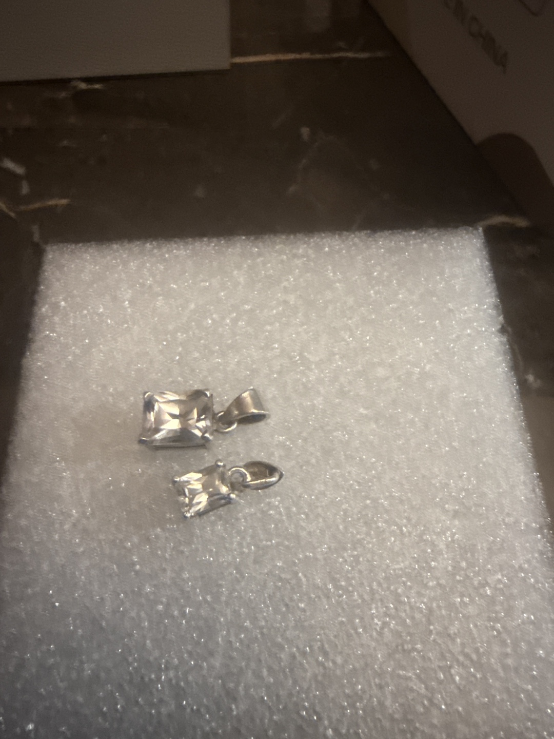 Two Silver Pendants