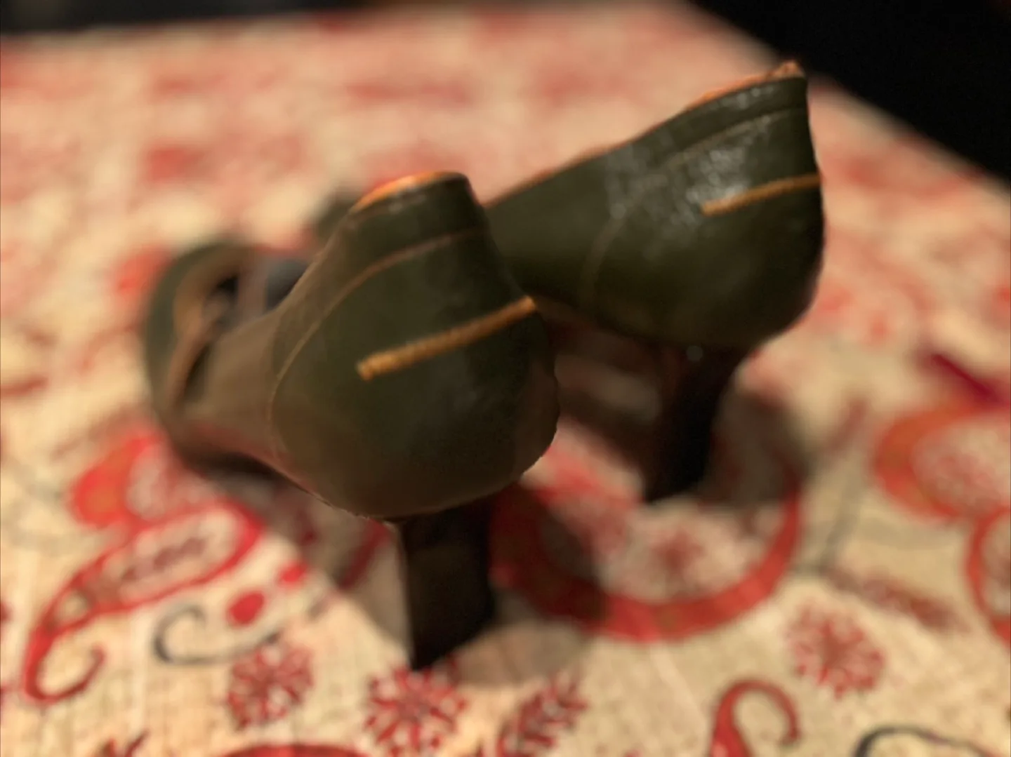 Green heels with slim strap and orange trim image indicator(3)