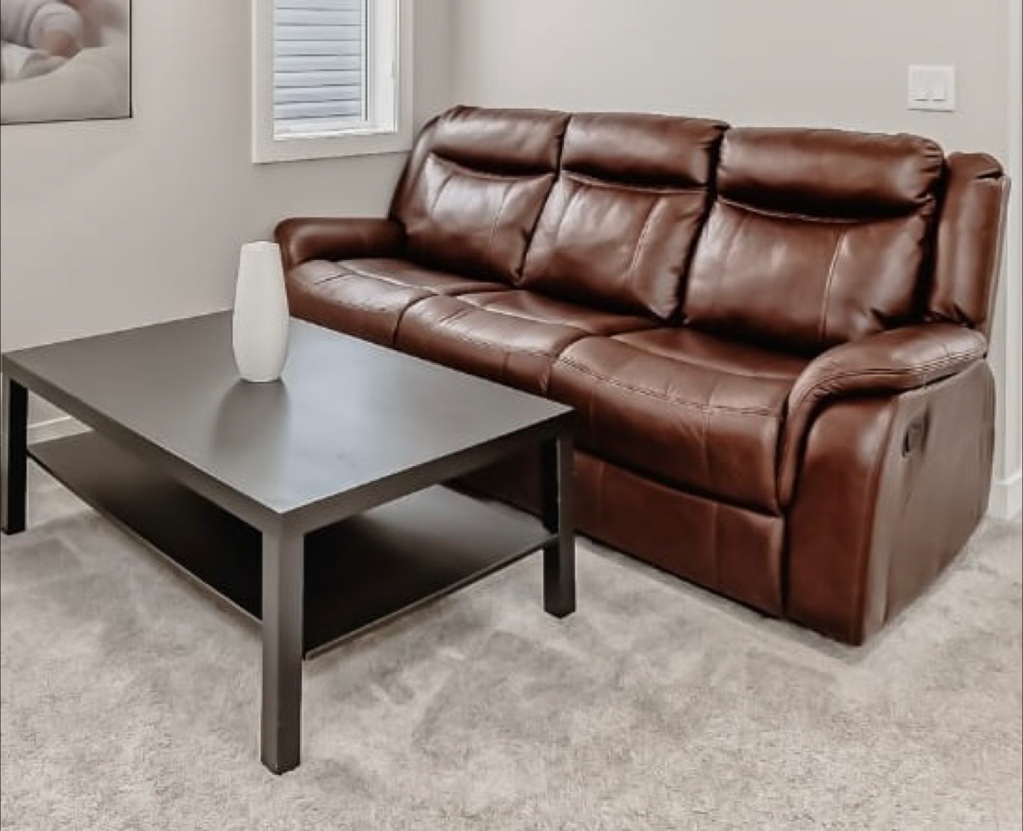 Brown Leather Reclining Sofa & Black Coffee Table