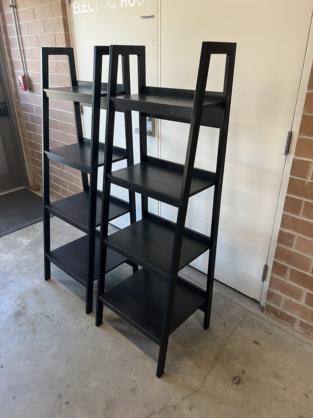 Two Black Ladder Shelf Bookcases - photo 4